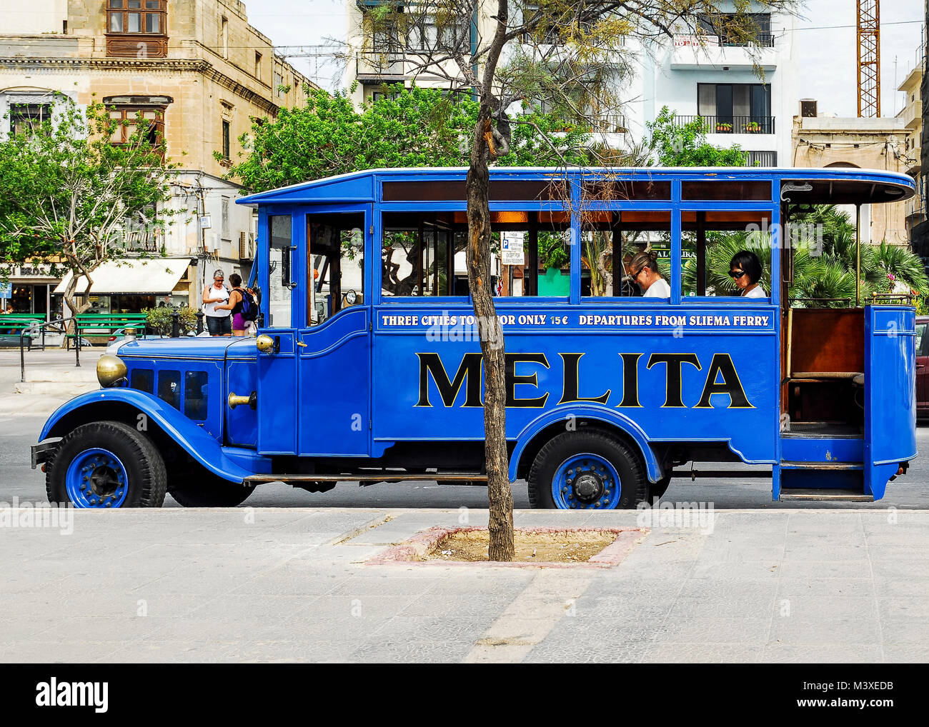 MALTA-SEPTEMBER 24: tourist bus waiting for departure in the streets of Sliema,Malta,on September 24,2010. Stock Photo