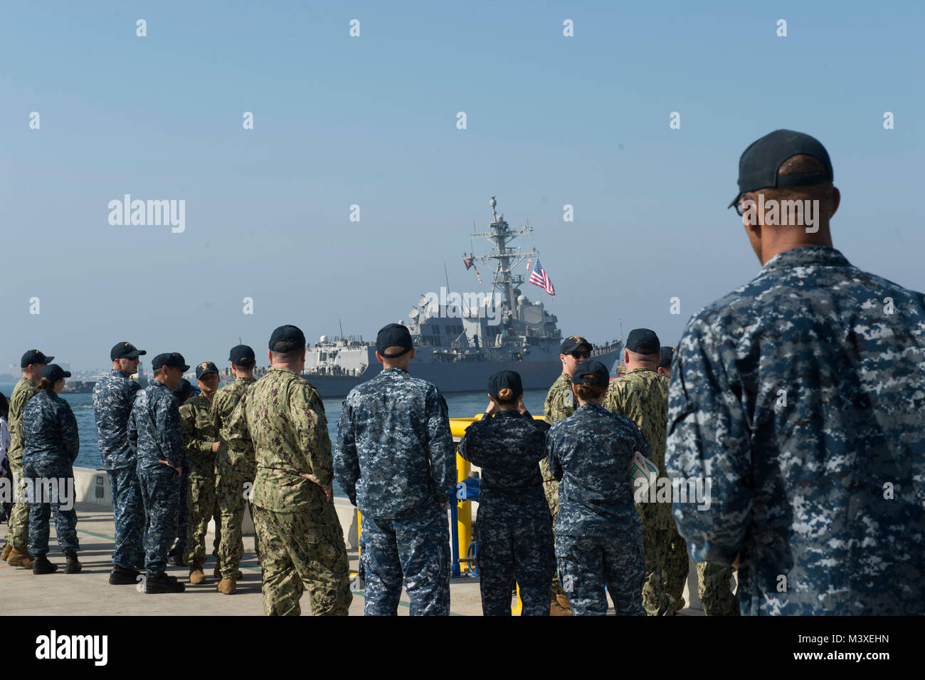 180206-N-HS117-0002  (SAN DIEGO) Arleigh Burke-class guided-missile destroyer USS Sterett (DDG104), along with USS Dewey (DDG 105), departed Naval Base San Diego for a scheduled deployment to conduct operations in the Indo-Pacific Region, Feb. 6. Dewey and Sterett will also support the Wasp Expeditionary Strike Group deployment in order to advance U.S. Pacific Fleet's Up-Gunned ESG concept and will train with forward-deployed amphibious ships across all mission areas. (U.S. Navy video by Mass Communication Specialist Seaman Apprentice Jeffery L. Southerland/RELEASED) Stock Photo
