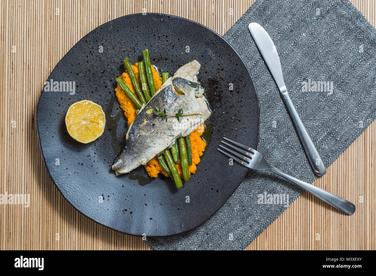 Fish, sweet potato puree, and beans Stock Photo - Alamy