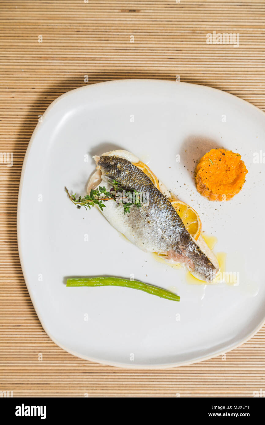 Fish, sweet potato puree, and beans Stock Photo - Alamy