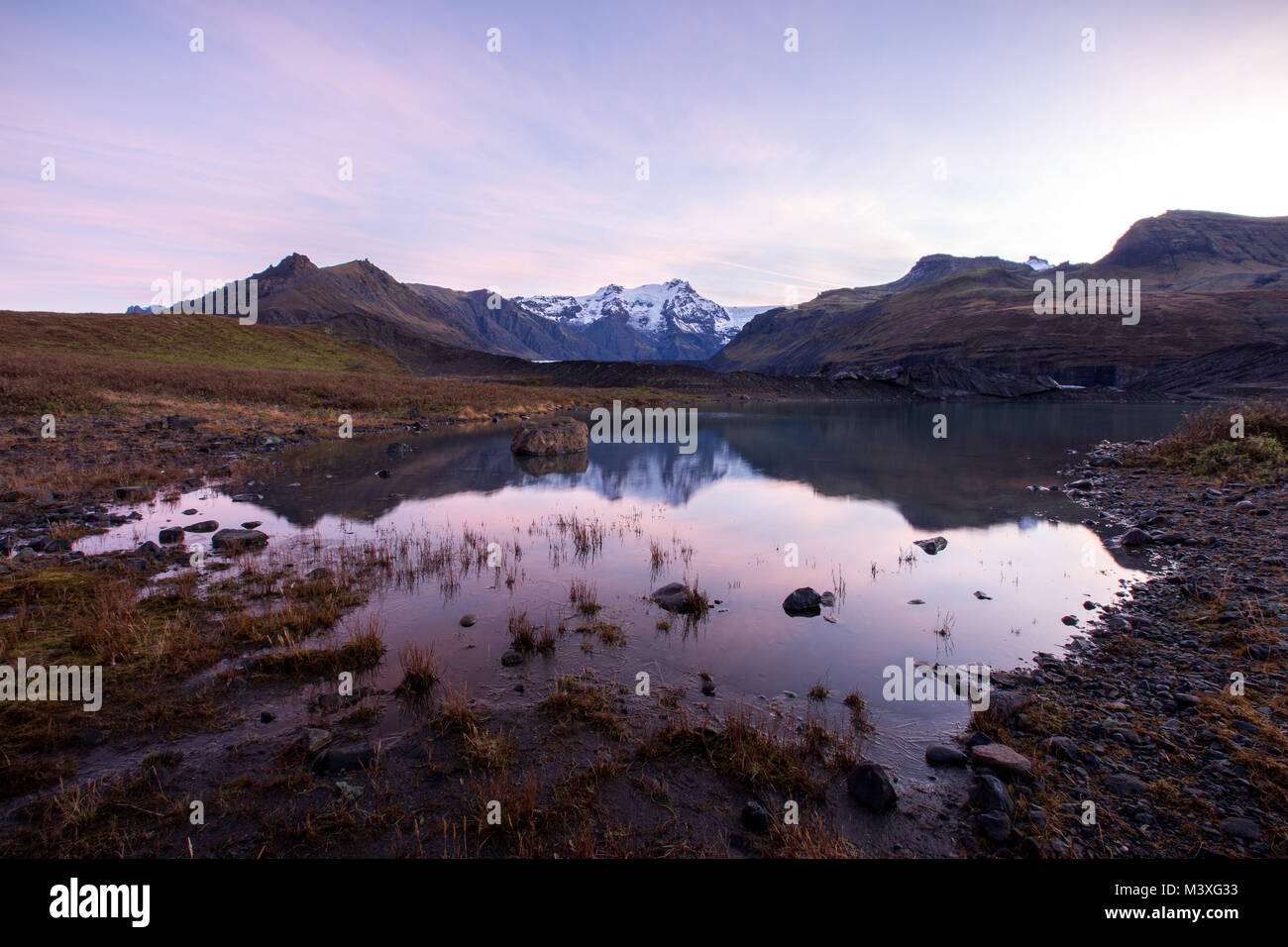 Mountains, glacier and glacial lake Morsarlon in Skaftafell National Park of Iceland. landscape South Iceland Sunset and Sunrise Stock Photo