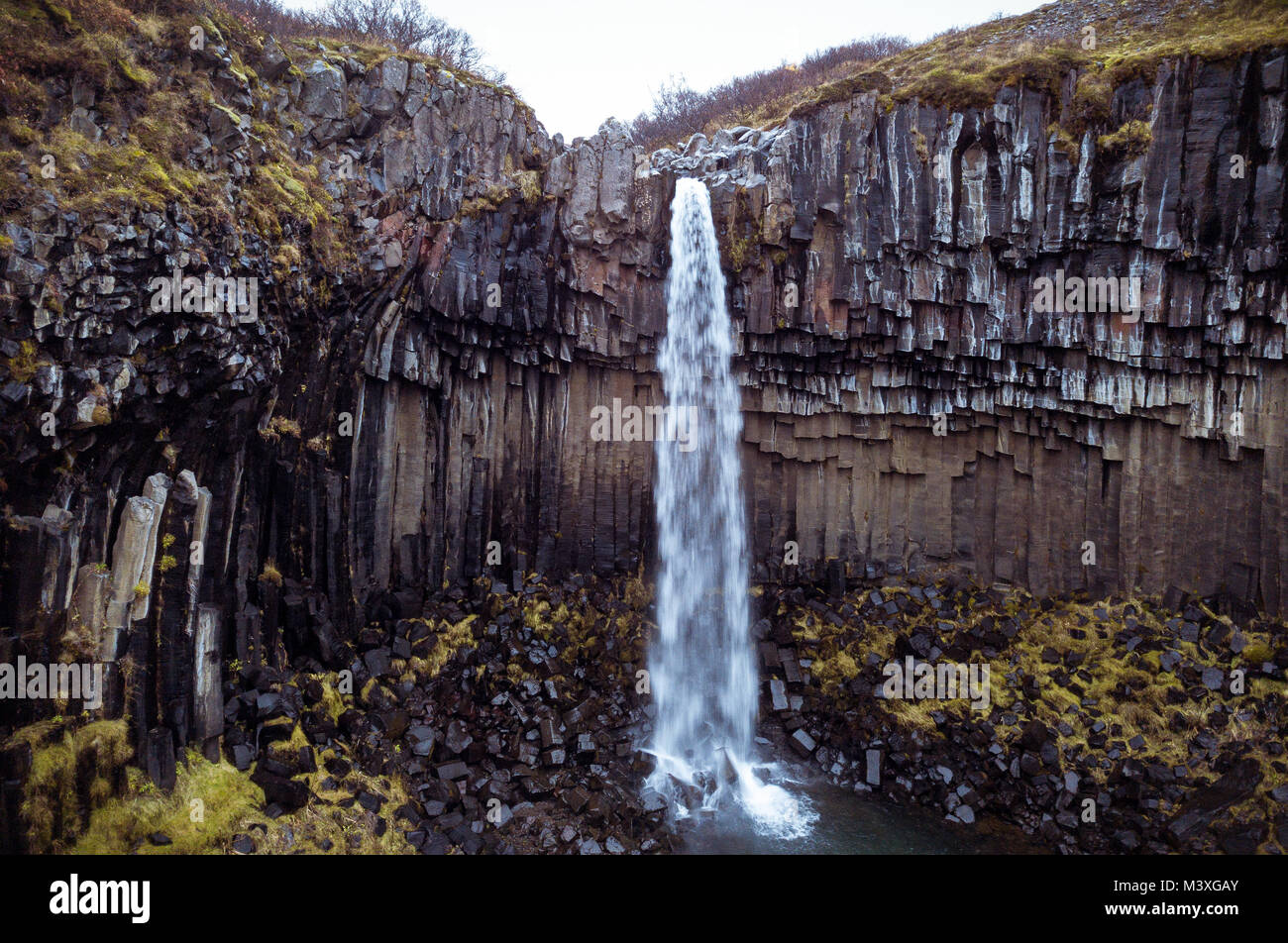 beautiful Svartifoss Waterfall and Sjonarnipa at Skaftafell national park in south Iceland southern Iceland Stock Photo
