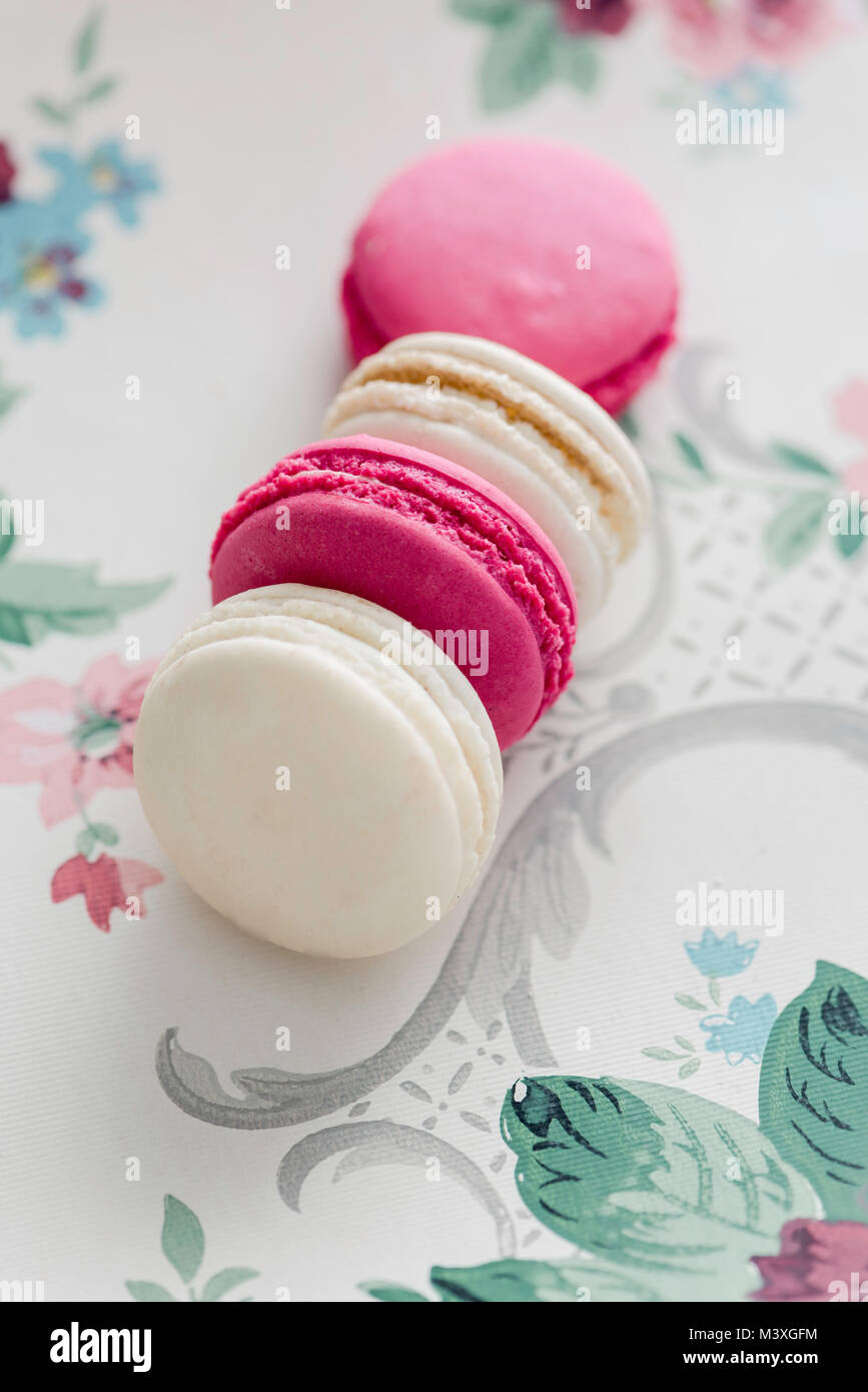 Macaroons on a pastel background Stock Photo
