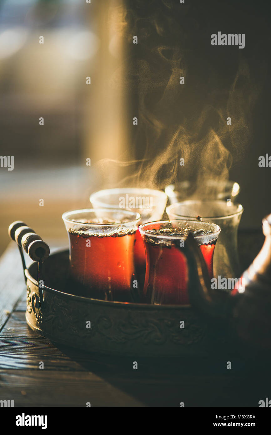 Traditional hot steaming Turkish tea in tulip glasses Stock Photo Alamy