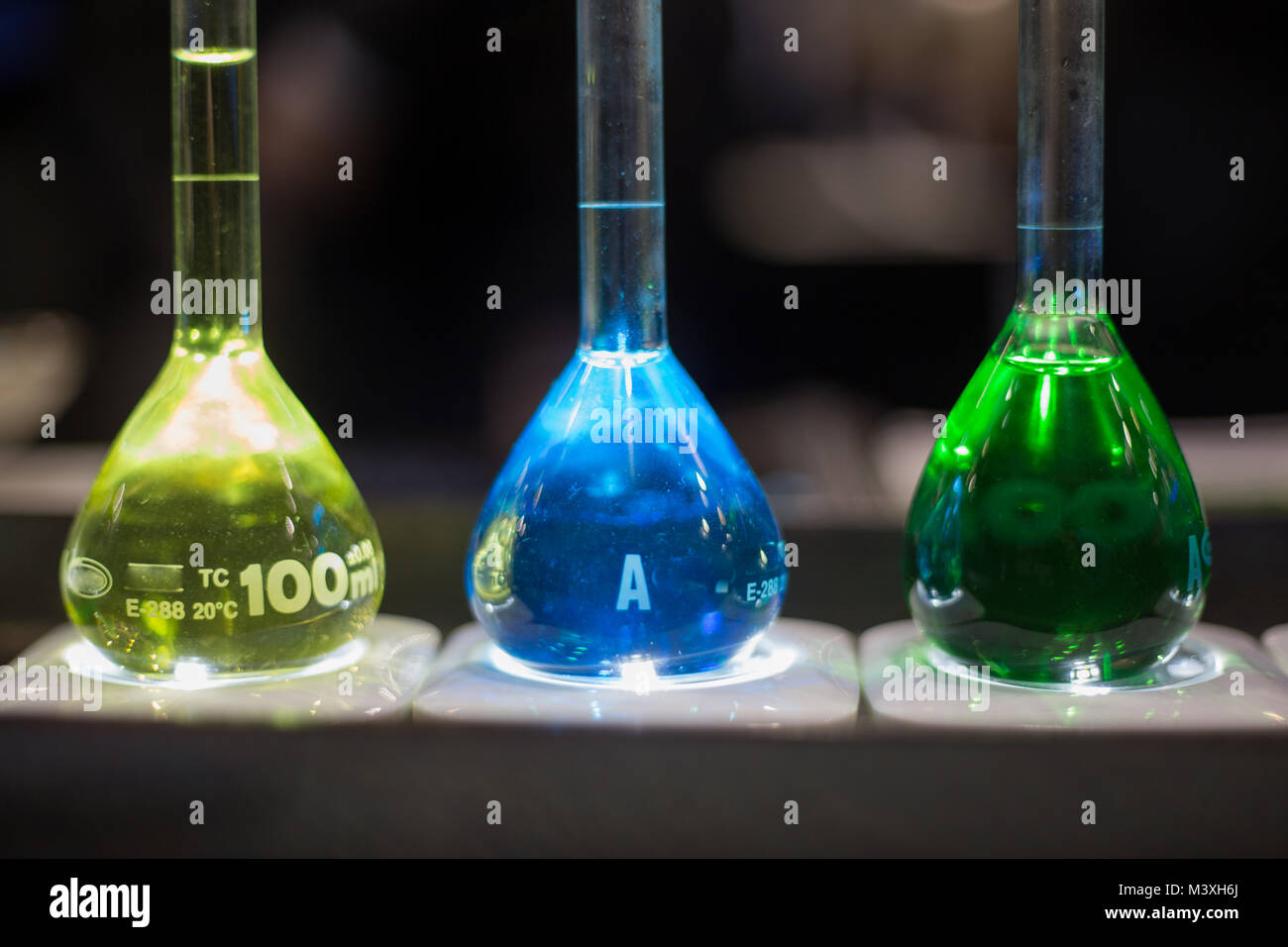 Concept lab test glass chemistry bottles dark background Stock Photo