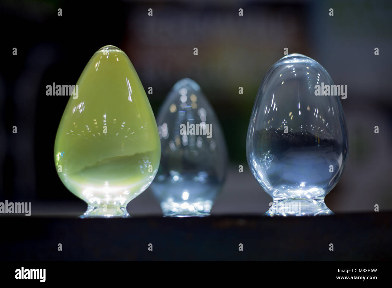 Enigmatic container potion egg shaped glass bottles Stock Photo Alamy