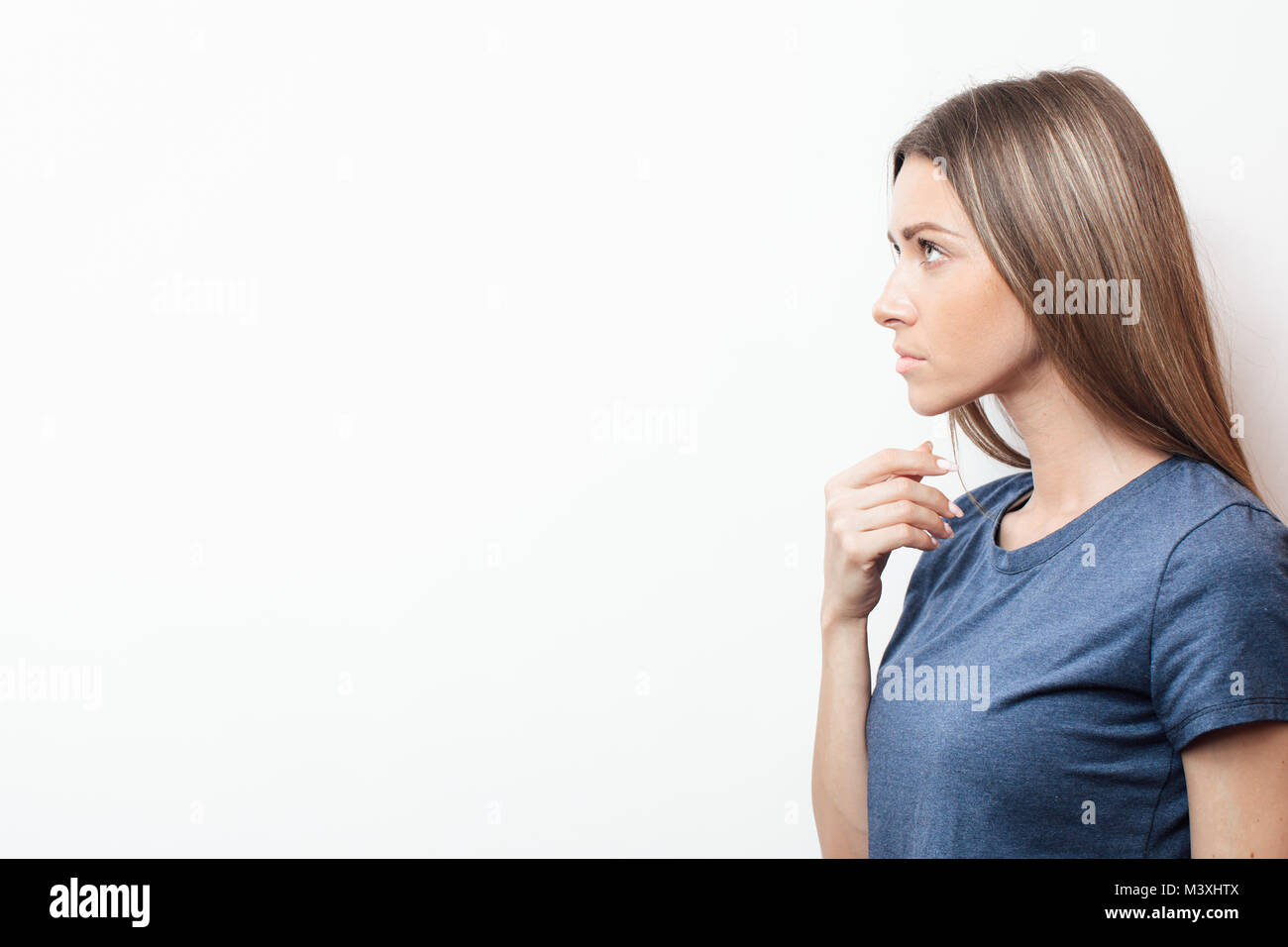 The dissatisfied girl. Anxiety. Disease. Sadness. Disorder Stock Photo