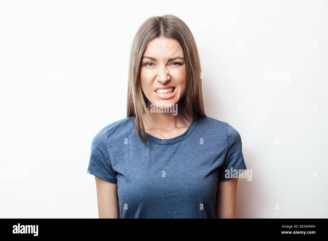 The dissatisfied girl. Anxiety. Disease. Sadness. Disorder Stock Photo
