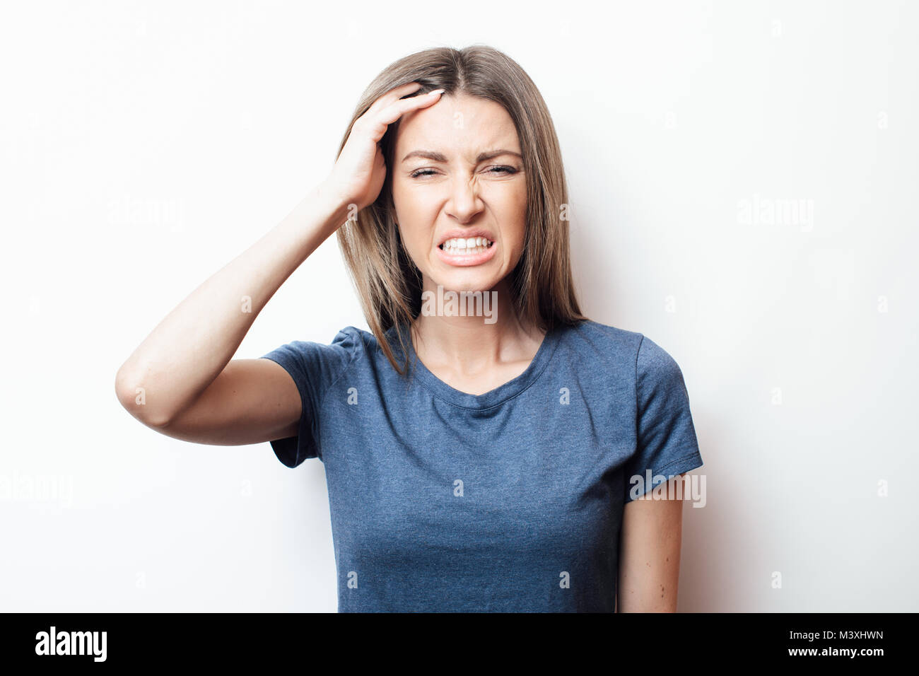 The dissatisfied girl. Anxiety. Disease. Sadness. Disorder Stock Photo