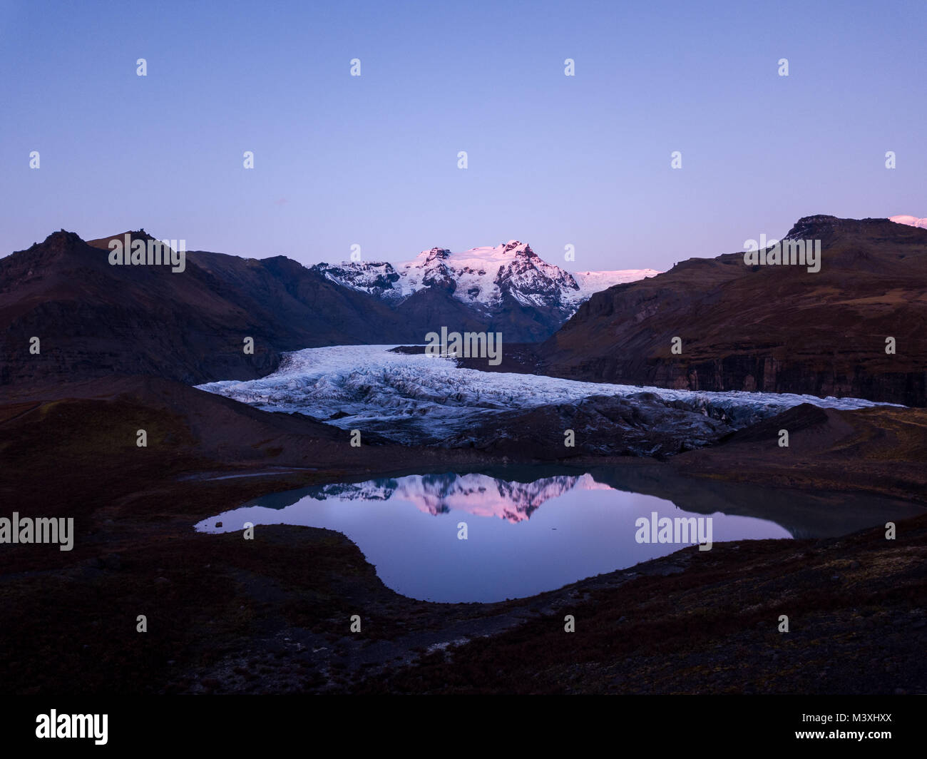 Mountains, glacier and glacial lake Morsarlon in Skaftafell National Park of Iceland. landscape South Iceland Sunset and Sunrise Stock Photo