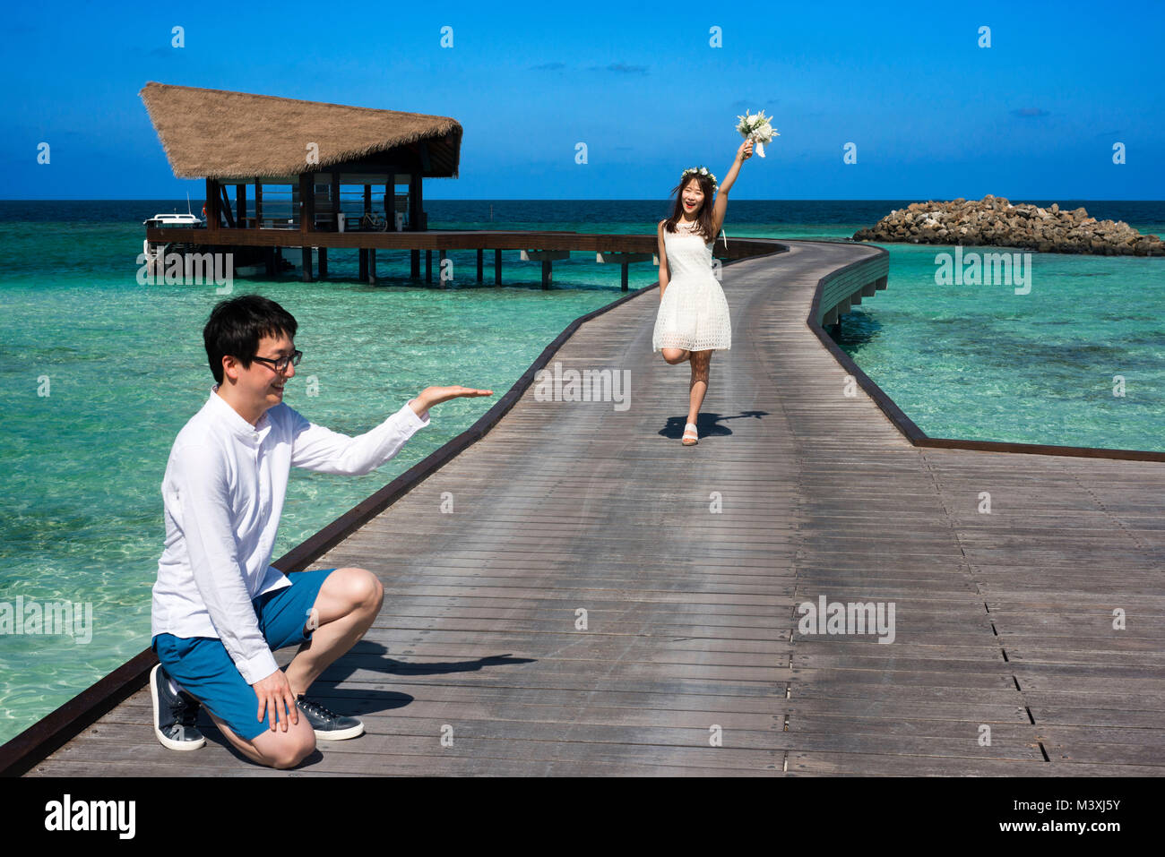 Asian honeymoon in The Residence Hotel and Resort, Gaafu Alifu Atoll. Maldives Islands. Stock Photo