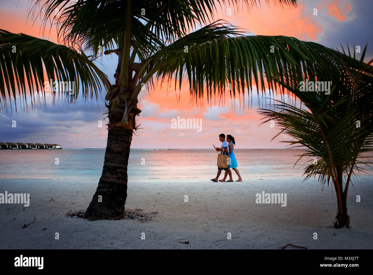 Sunset at the beach in The Residence Hotel and Resort, Gaafu Alifu Atoll. Maldives Islands. Stock Photo