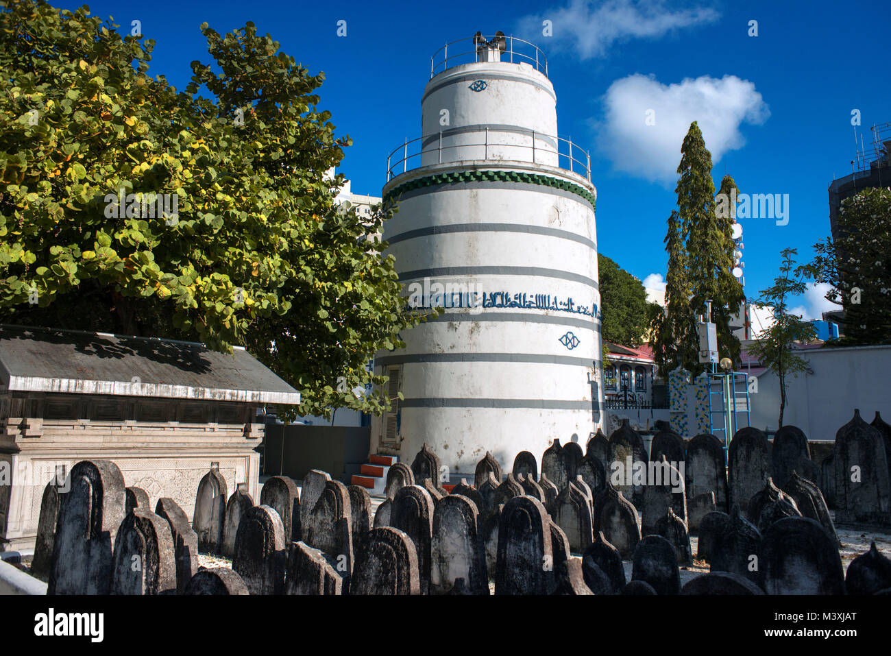 Old Friday Mosque and cemetery, Indian Ocean, Male, Maldives islands.  The Munnaaru Cylindrical Minaret Near Hukuru Miskiiy Stock Photo