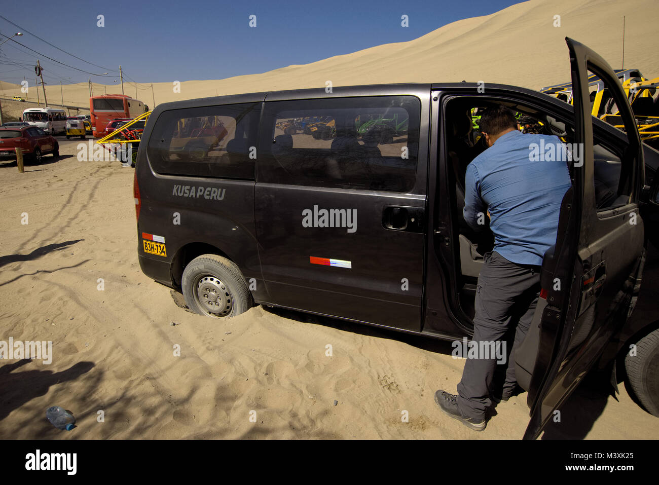 Minivan stuck in the sand, Ica Desert Peru Stock Photo