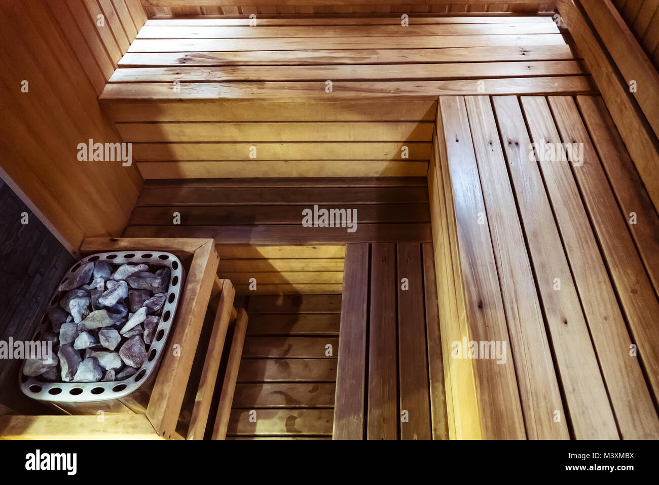 Interior of small home Finnish wooden sauna. Infrared sauna. Cedar bath. beautiful nature interior home finnish sauna room background. inside the saun Stock Photo