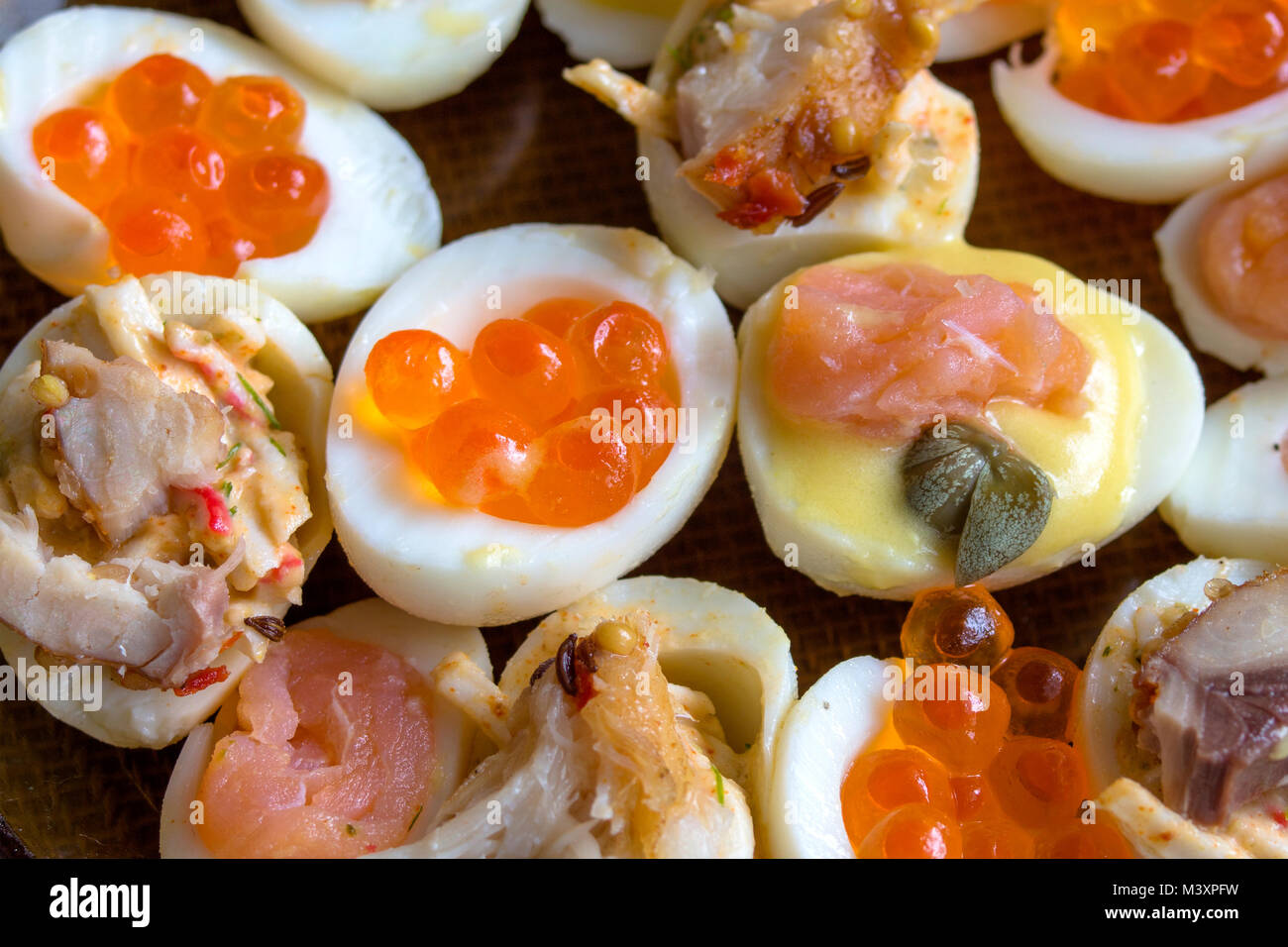 Stuffed quail eggs with seafood and mayonnaise from their yolks Stock Photo Alamy