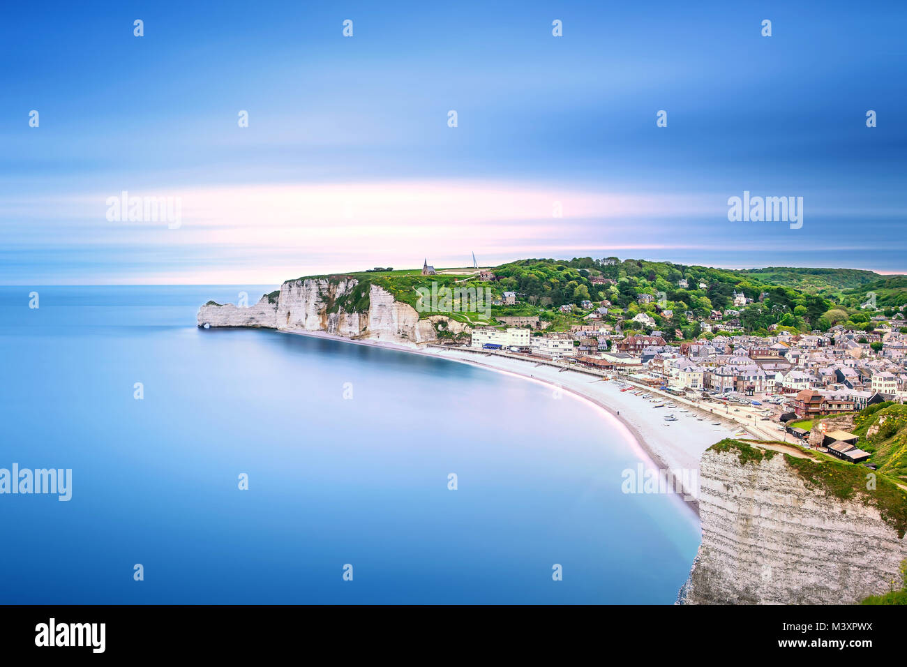 Etretat village and its bay beach, aerial view from cliff. Normandy ...