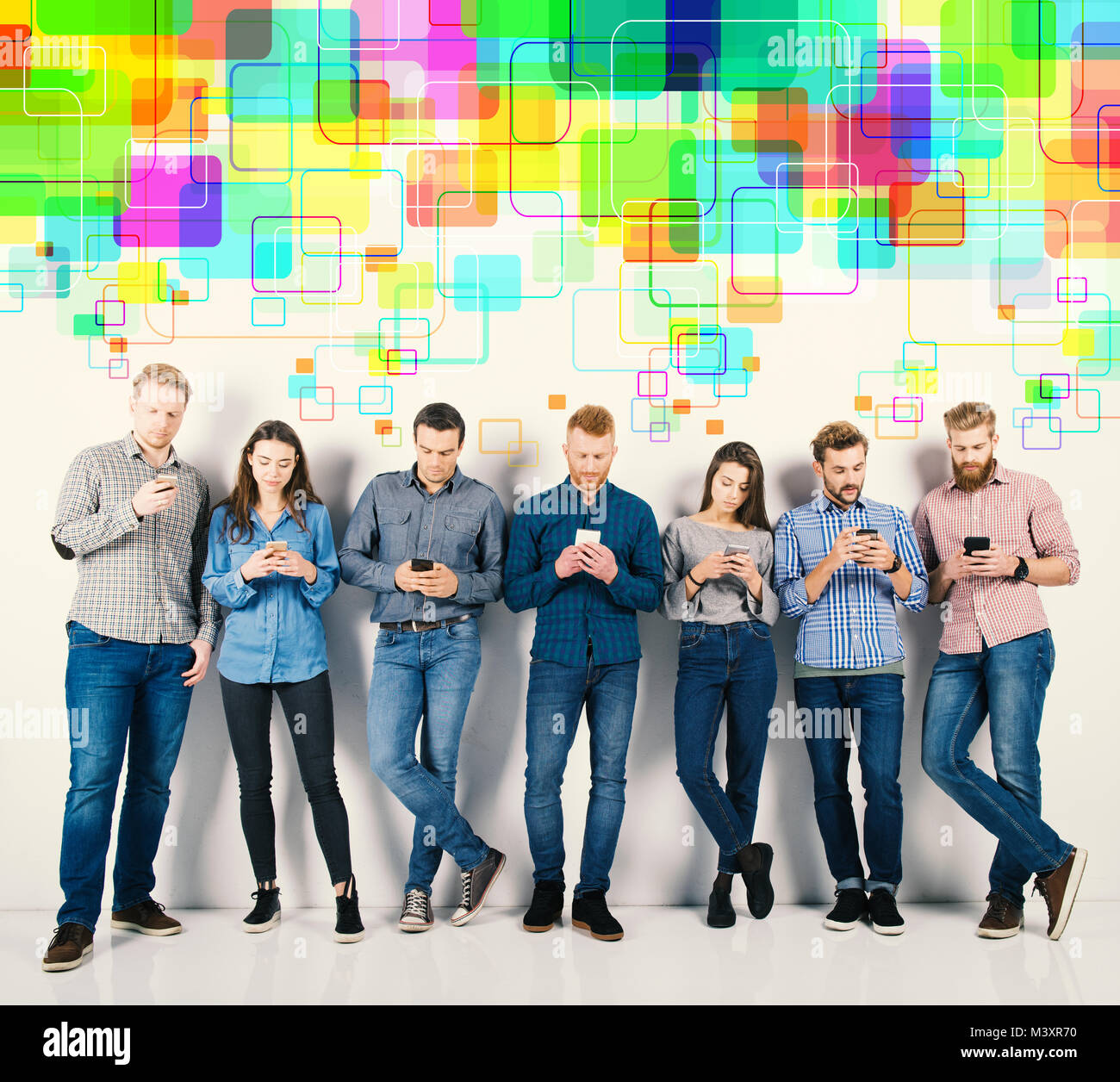 Group of boys and girls connected with their smartphones. Concept of internet and social network Stock Photo
