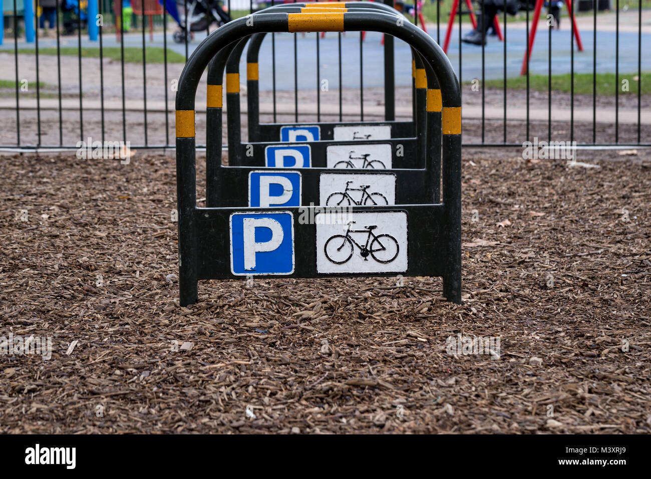 An empty bicycle parking rack in Battersea Park, London, England Stock