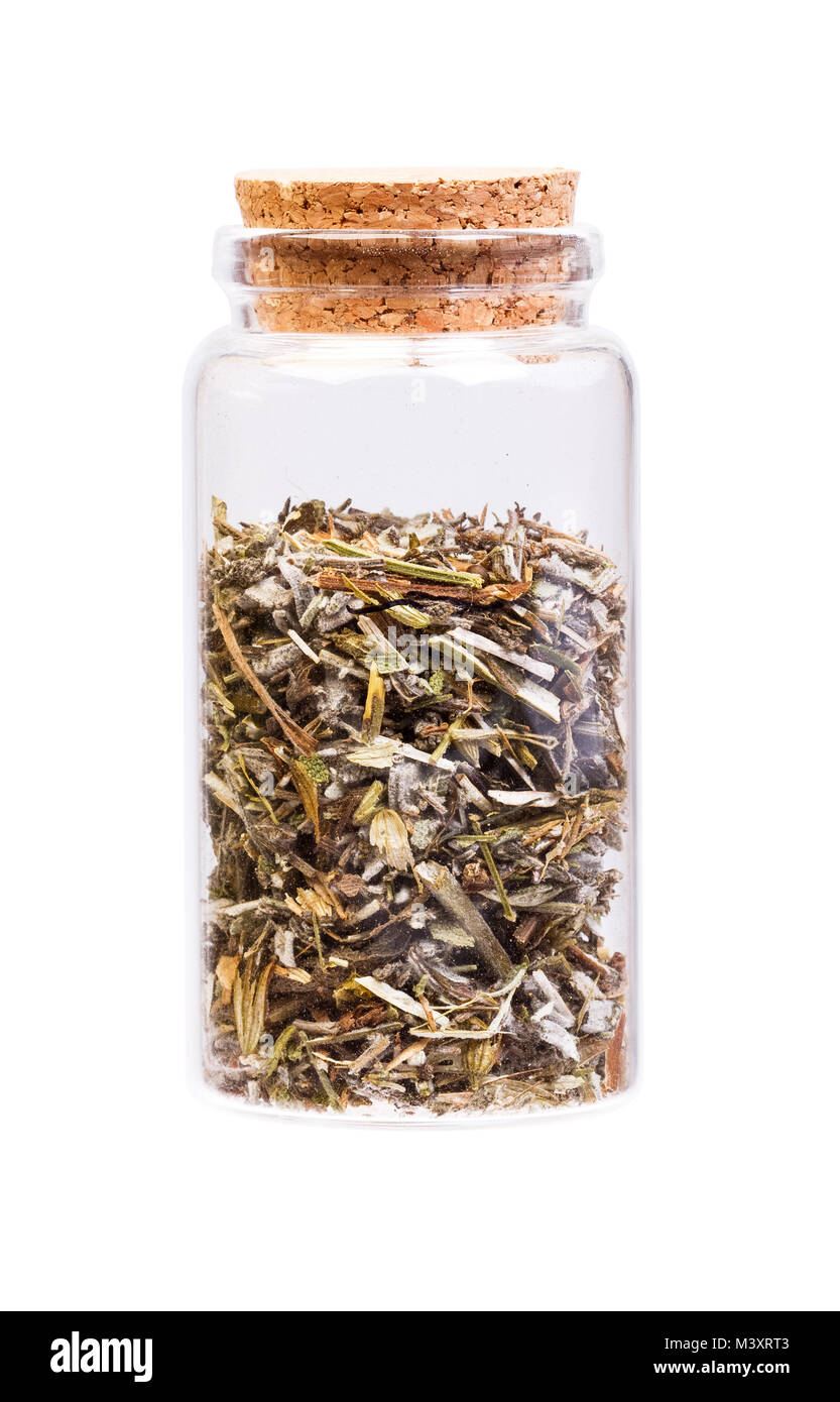 Dried Sage, medicinal herb in a bottle with cork stopper for medical use. Stock Photo