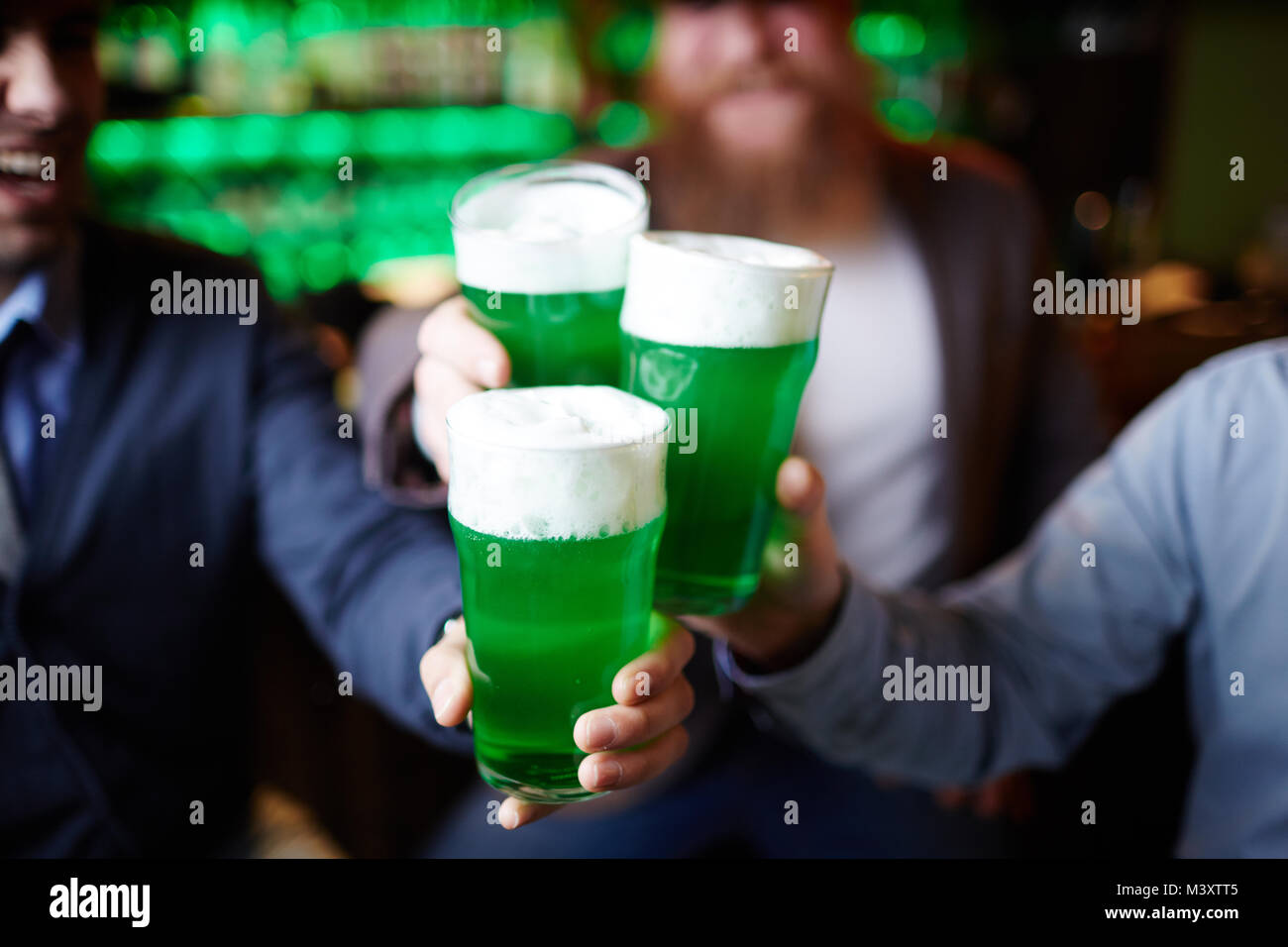 Toasting with beer Stock Photo - Alamy