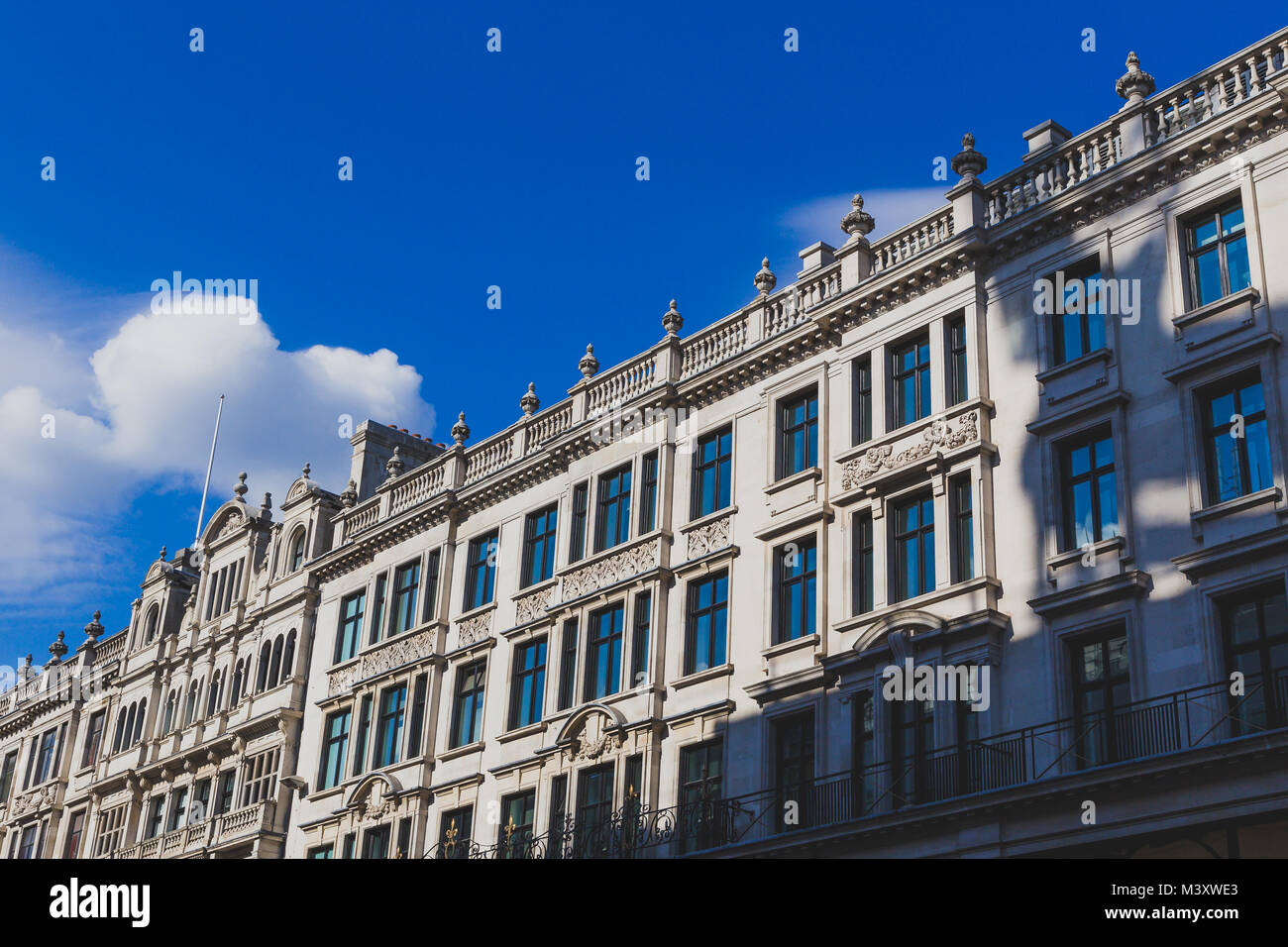 LONDON, UNITED KINGDOM - August, 22th, 2015: detail of Regent Street in central London under a vibrant sky Stock Photo