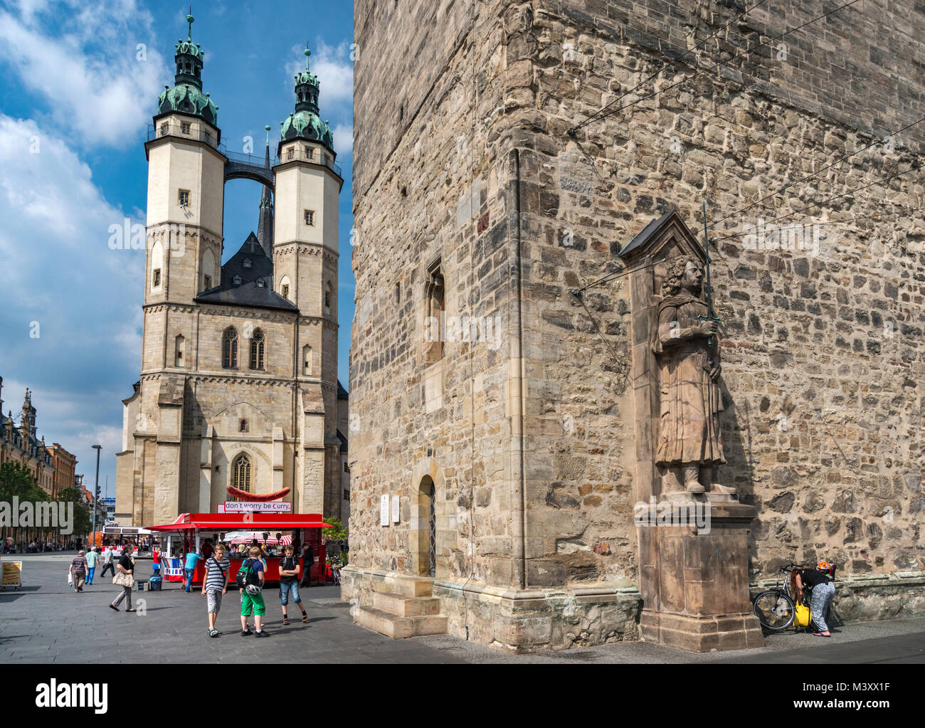 Statue of Roland, 13th century, Roter Turm (Red Tower), Marktkirche (Market Church of St Mary) behind, in Halle an der Saale, Saxony-Anhalt, Germany Stock Photo