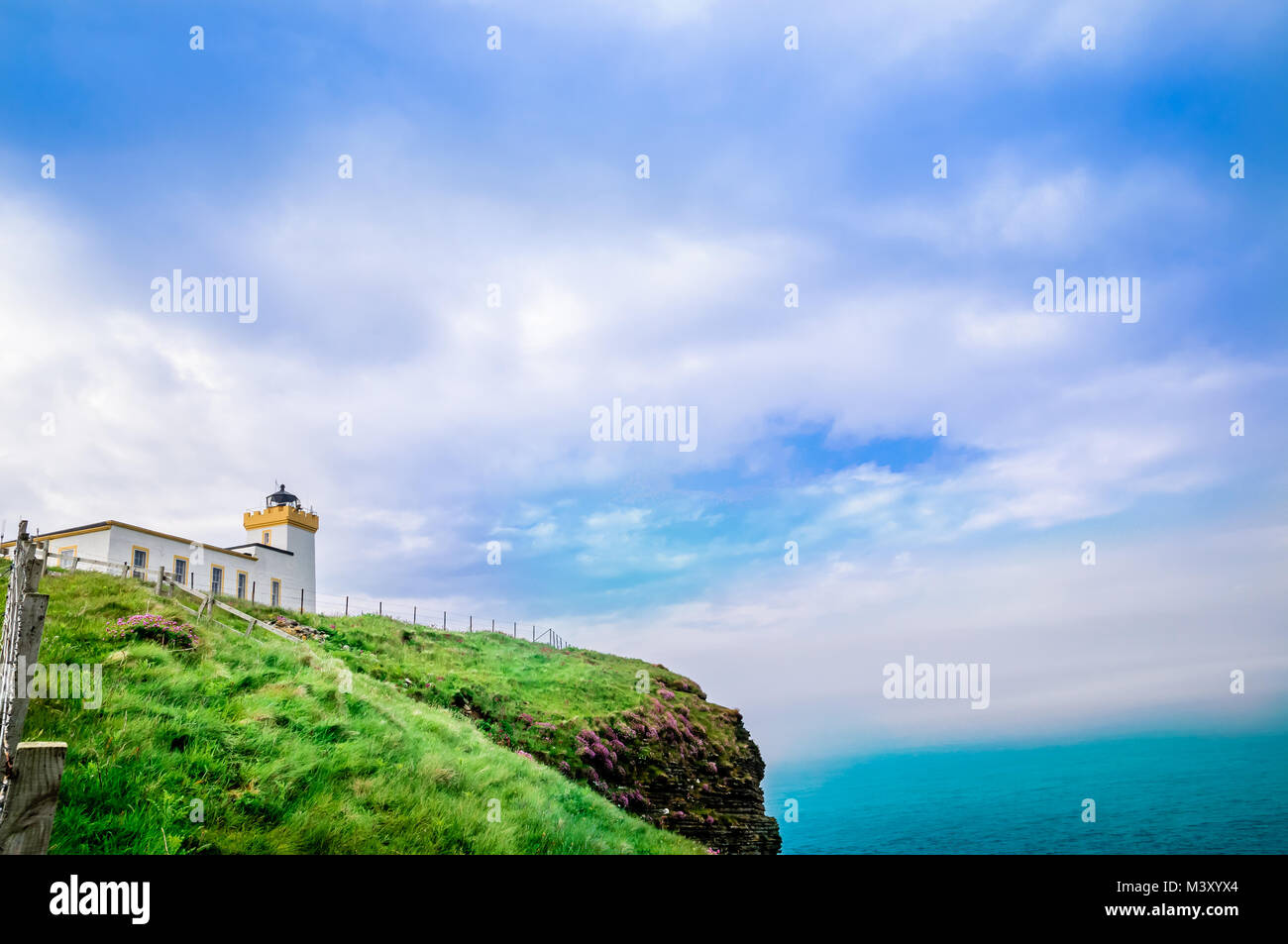 View on lighthouse by Duncansby Head in Scotland Stock Photo