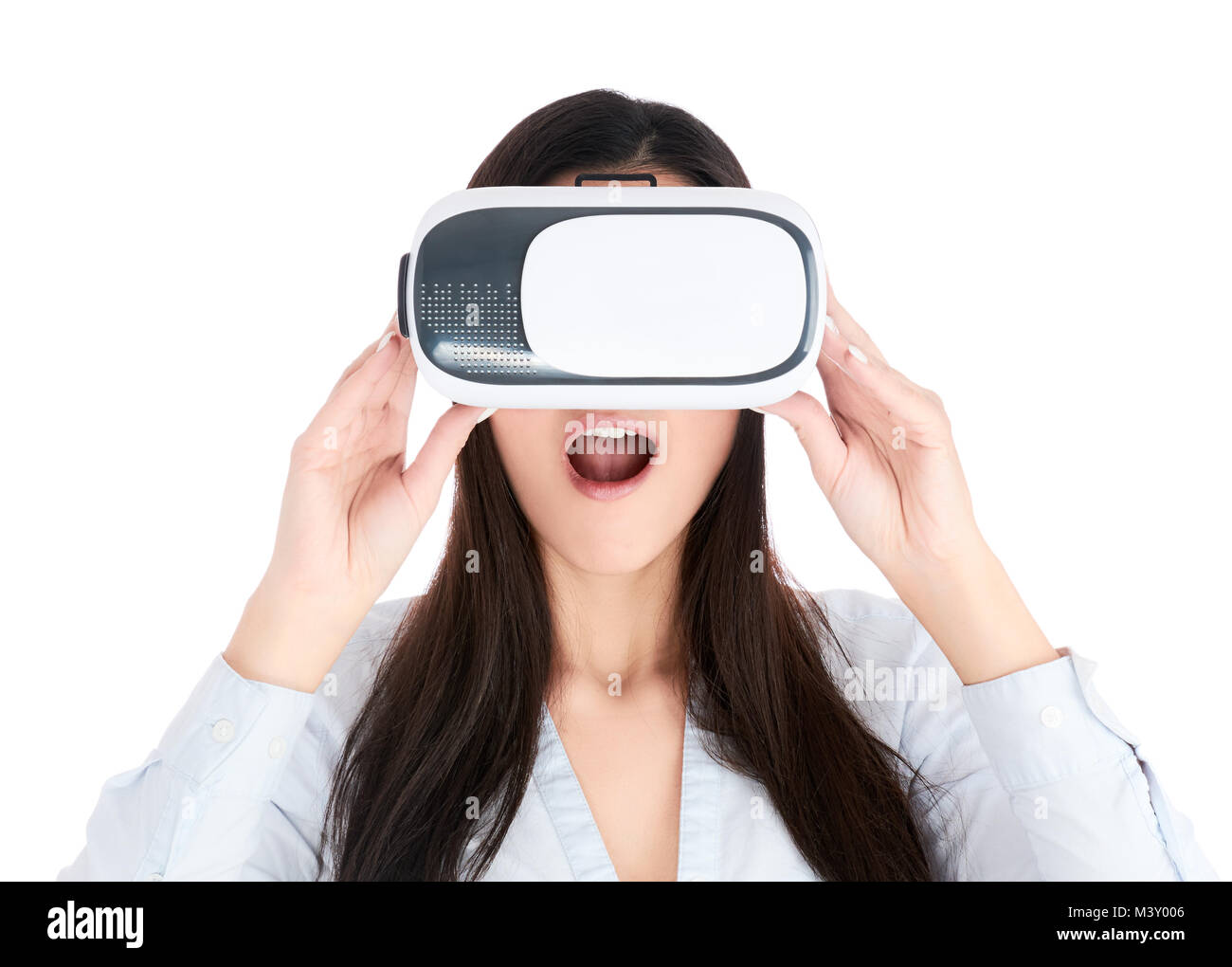 Young woman is using VR headset isolated on white background Stock ...
