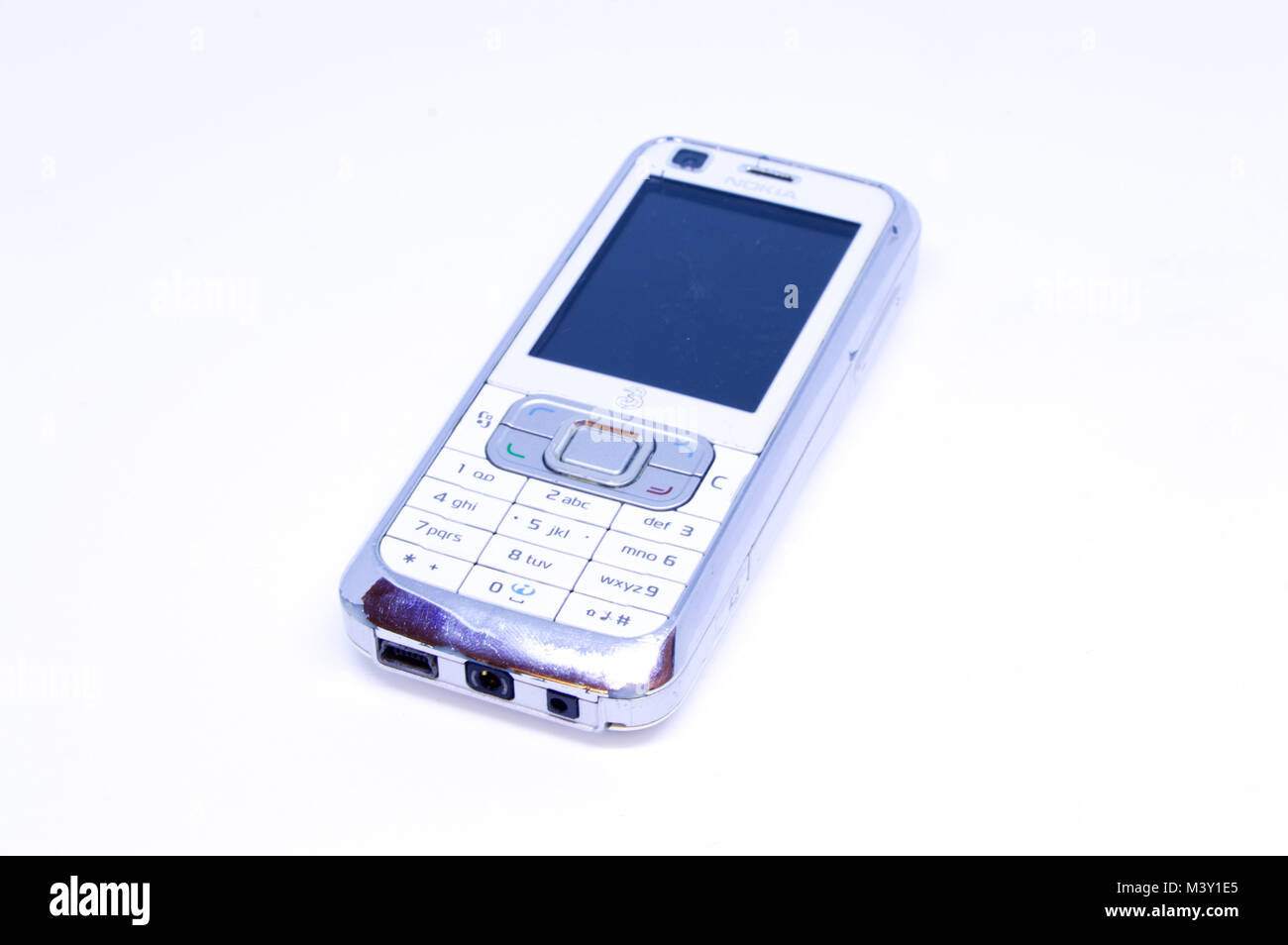 Old Nokia 6120 mobile phone released in 2007, photographed against a white background Stock Photo