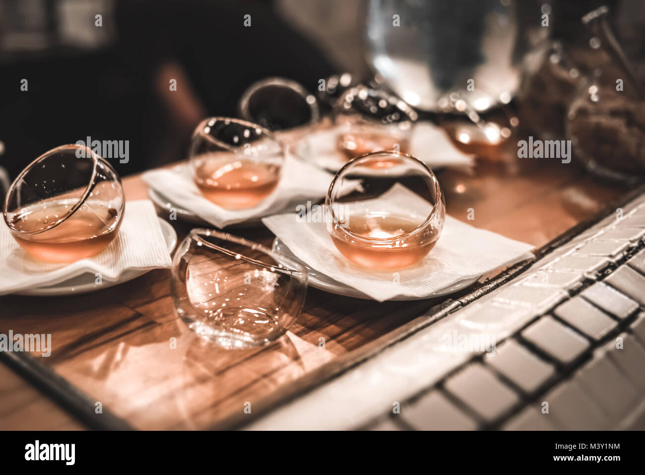 Tea in Glass saucers from the restaurant, flashlight, restaurant Stock