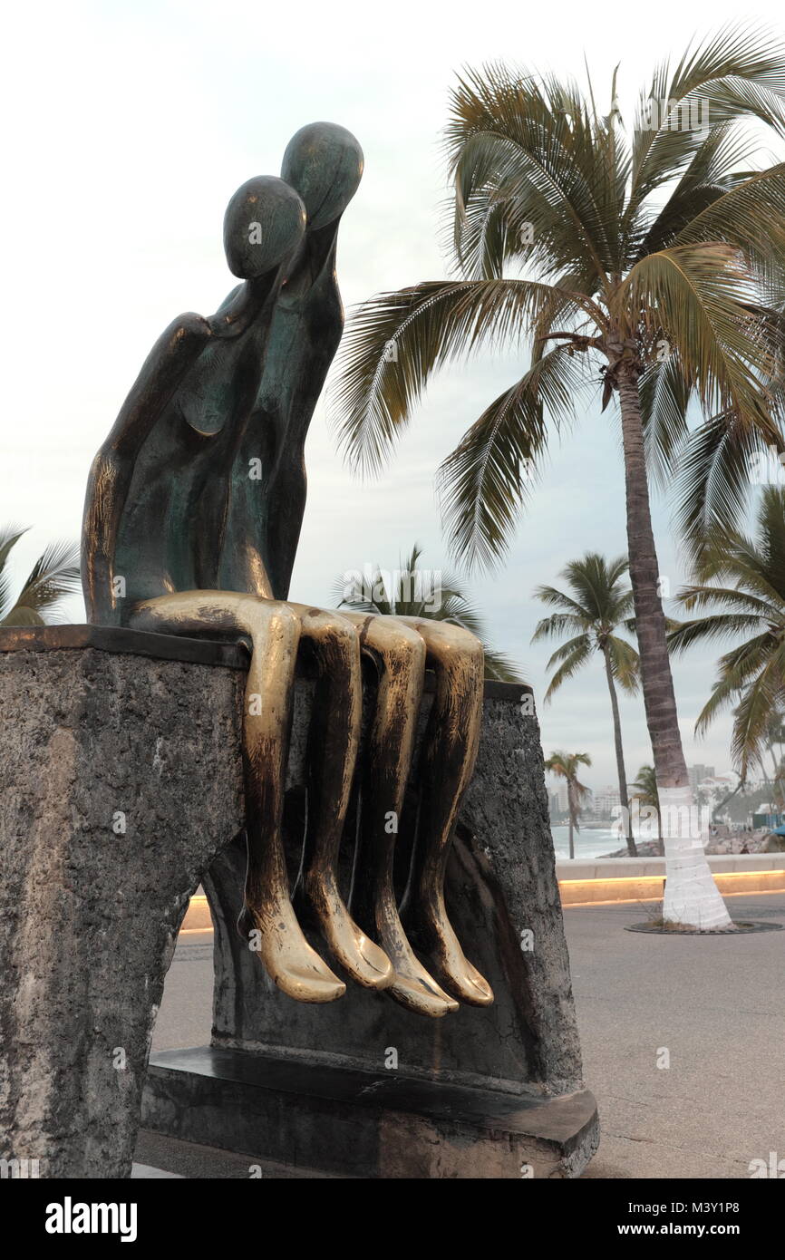 The public art 'Nostalgia' has been a recognized fixture on the Puerto Vallarta, Mexico malecon since 1984. Stock Photo
