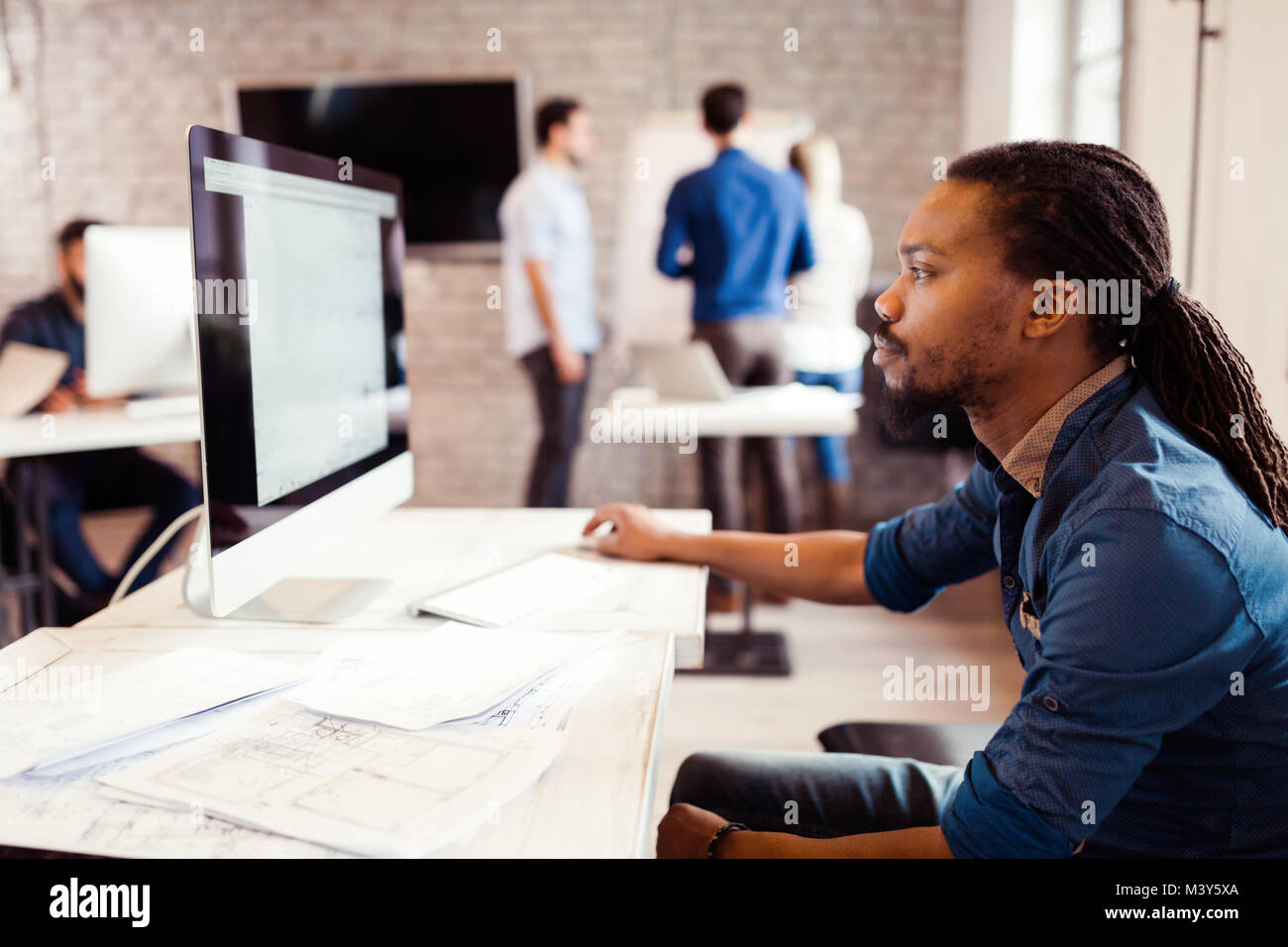 Picture of architects working together in office Stock Photo