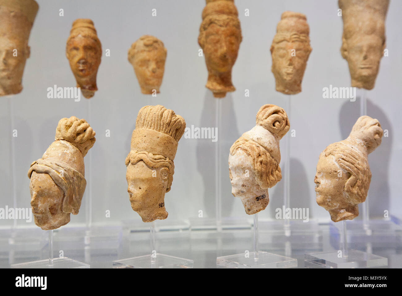 Heads of female figurines found in Piskokephalo (Sitia) dated 1650-1500 BC, Archaeological Museum of Heraklion, Iraklio, island of Crete, Greece, Euro Stock Photo