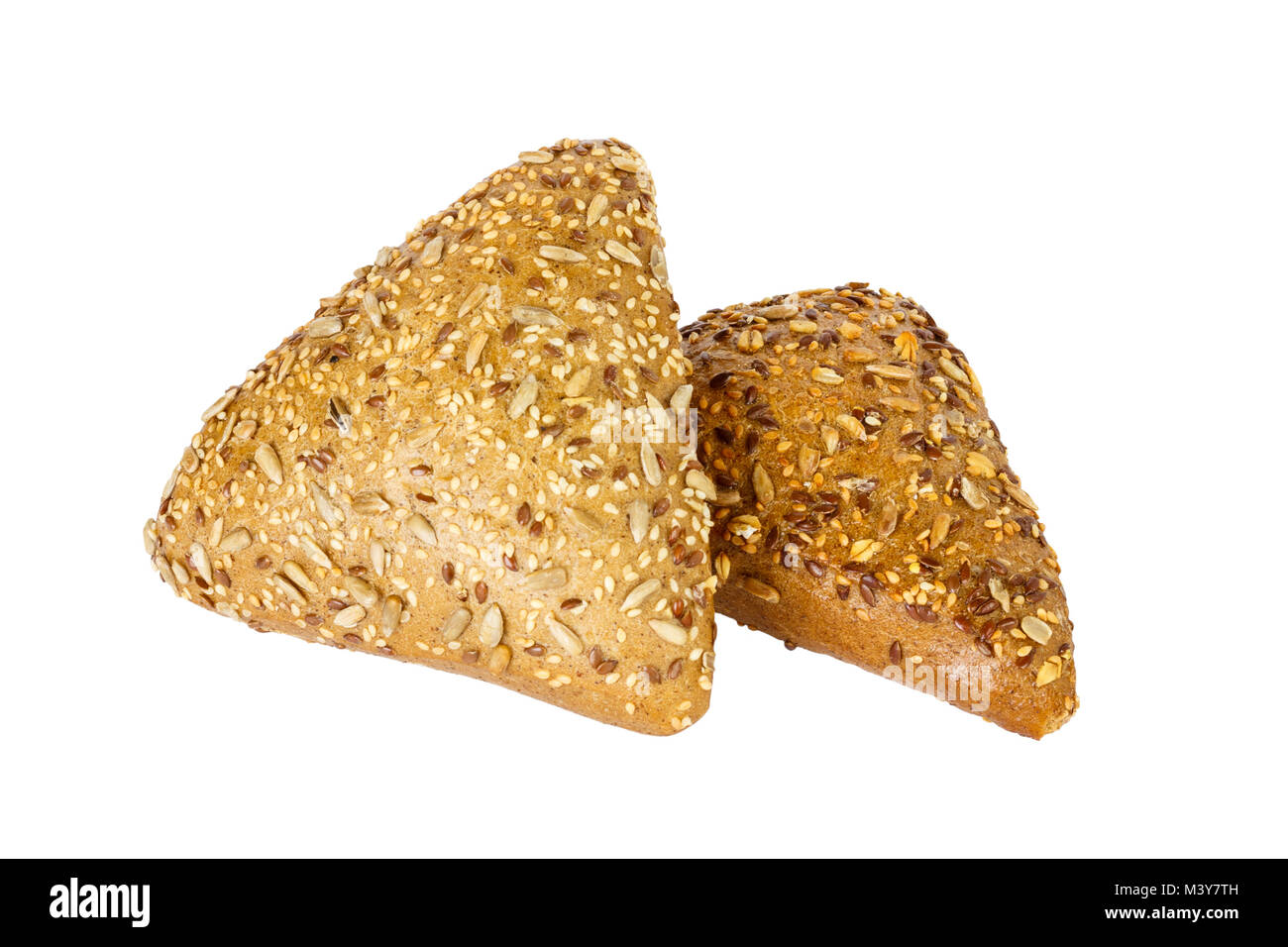 Closeup of two rye bread with flax seeds isolated on white background ...
