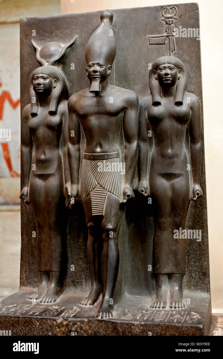 Egypt, Cairo, the Egyptian Museum of Cairo, triad with Mykerinos surrounded by Hathor and a genius personifying one of the provinces of Egypt with the Stock Photo