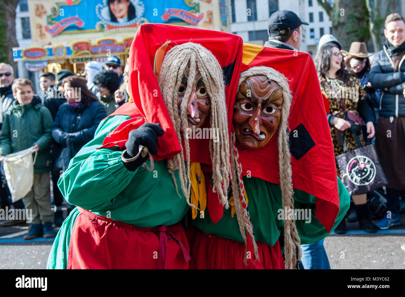 Düsseldorf, Germany, 12 February 2018. The Carnival events features more than 300 Carnival shows, balls, anniversaries, receptions and costume parties. The motto this season is ‘Jeck erst recht’ (Carnival more than ever). The Rose Monday Parade is the culmination of the celebration and gathers 5,000 participants that join the procession through the city. It featuring more than 30 music ensembles and elaborately built and decorated floats addressing cultural and political issues with a satirical, hilarious and controversial mood, such as the famous politically themed floats of Jacques Tilly. Stock Photo