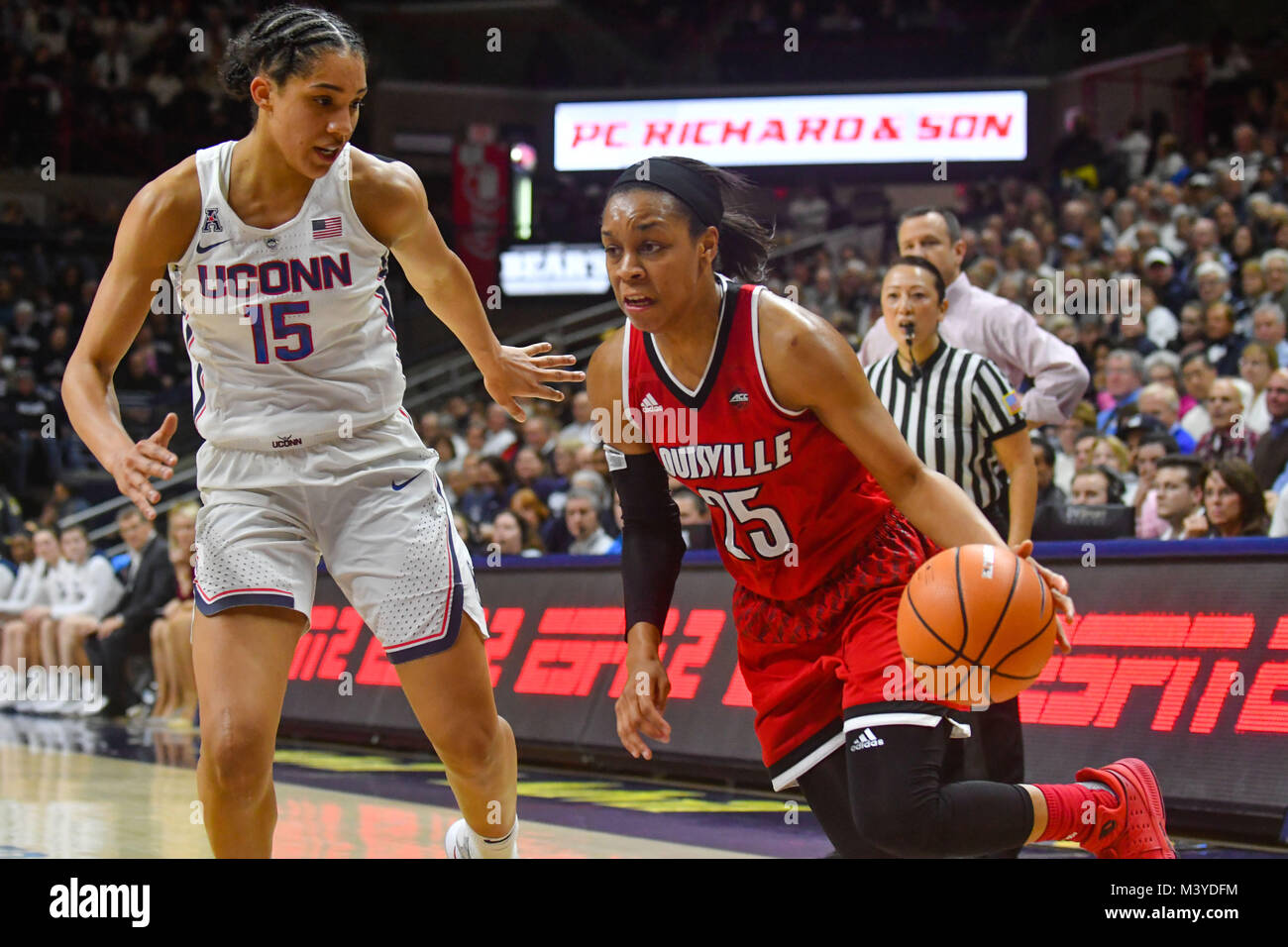 Stores, Connecticut, USA. 12th Feb, 2018. Asia Durr (25) of the Louisville Cardinals drives to the basket during a game against Uconn Huskies at Gampel Pavilion in Stores, Connecticut. Gregory Vasil/Cal Sport Media/Alamy Live News Stock Photo
