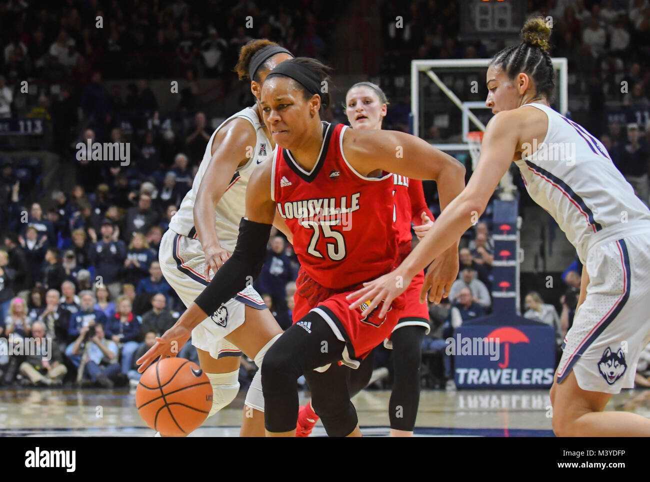 Stores, Connecticut, USA. 12th Feb, 2018. Asia Durr (25) of the Louisville Cardinals drives to the basket during a game against Uconn Huskies at Gampel Pavilion in Stores, Connecticut. Gregory Vasil/Cal Sport Media/Alamy Live News Stock Photo