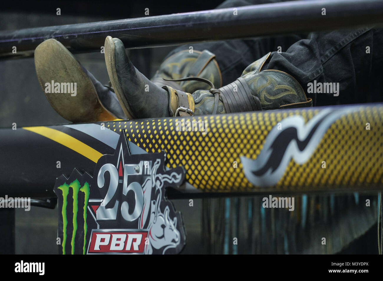 Kansas City, Missouri, USA. 10th Feb, 2018. A rider rests his boots on