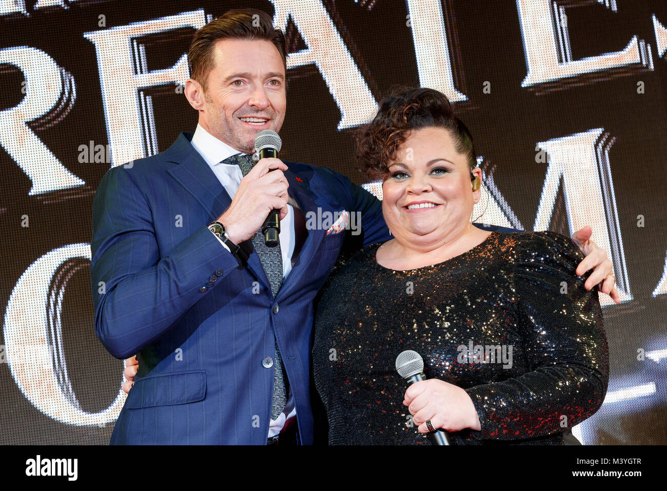 Tokyo, Japan. 13th Feb, 2018. (L to R) Australian actor Hugh Jackman and American actress/singer Keala Settle, speak during a special red carpet event for the film ''The Greatest Showman'' on February 13, 2018, Tokyo, Japan. The Japanese musical movie directed by Michael Gracey will be released in Japan on February 16. Credit: Rodrigo Reyes Marin/AFLO/Alamy Live News Stock Photo