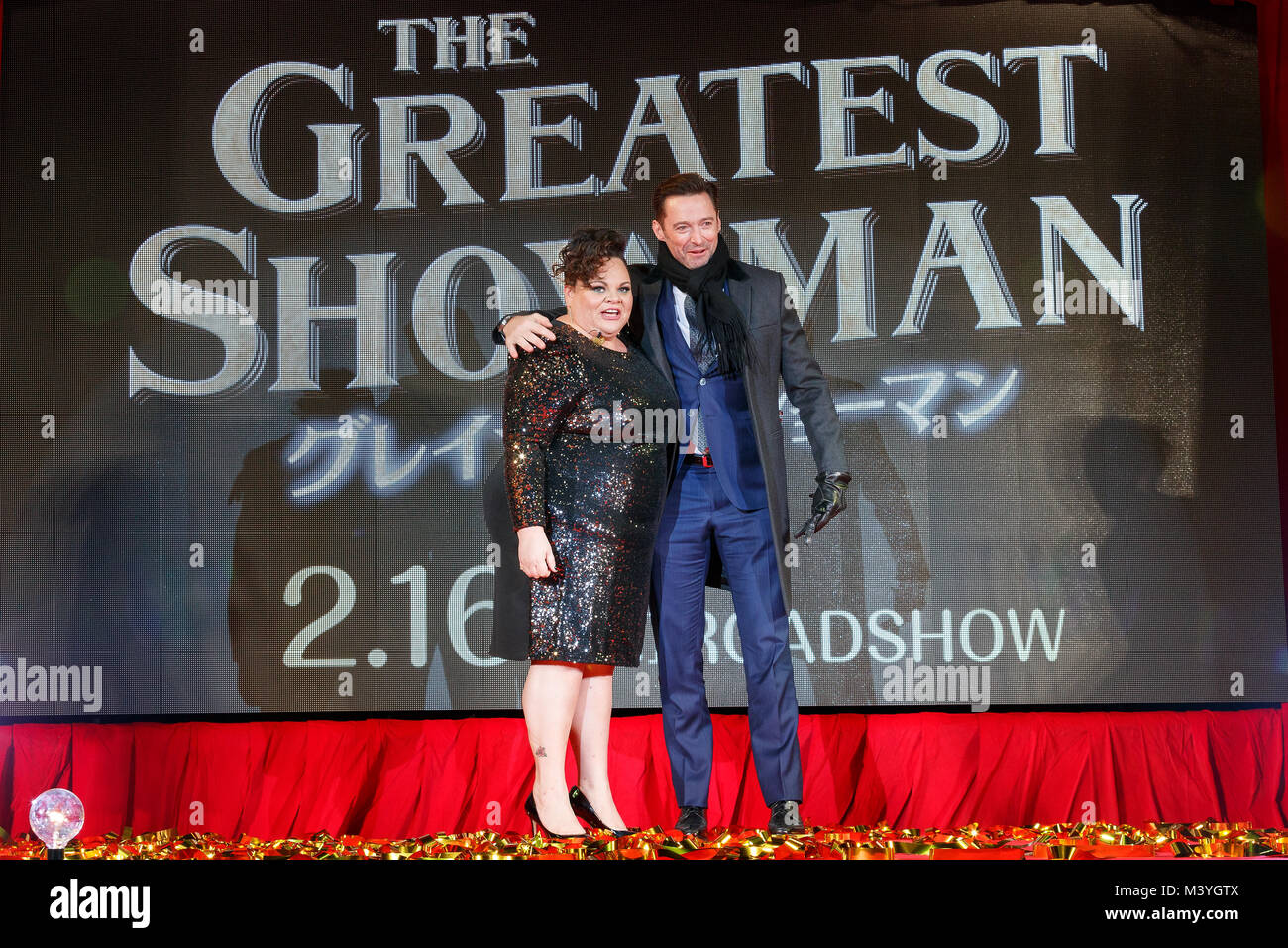 Tokyo, Japan. 13th Feb, 2018. (L to R) American actress/singer Keala Settle and Australian actor Hugh Jackman, pose for the cameras during a special red carpet event for the film ''The Greatest Showman'' on February 13, 2018, Tokyo, Japan. The Japanese musical movie directed by Michael Gracey will be released in Japan on February 16. Credit: Rodrigo Reyes Marin/AFLO/Alamy Live News Stock Photo