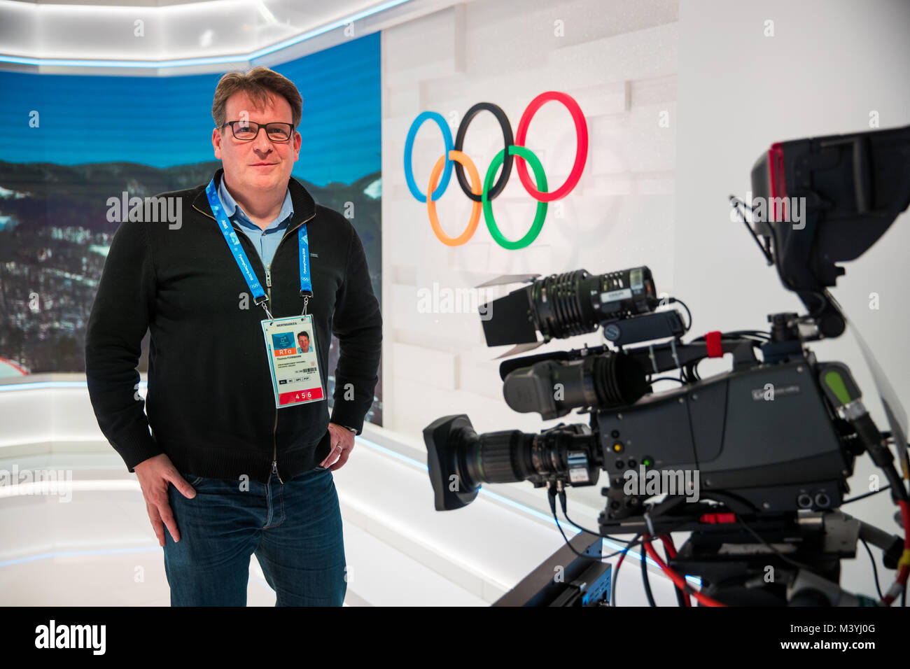 Pyeongchang, South Korea. 13th Feb, 2018. Thomas Fuhrmann, chief editor at the sports desk of German broadcaster ZDF, stands in the studio of the International Broadcast Centre (IBC) in Pyeongchang, South Korea, 13 February 2018. Credit: Daniel Karmann/dpa/Alamy Live News Stock Photo
