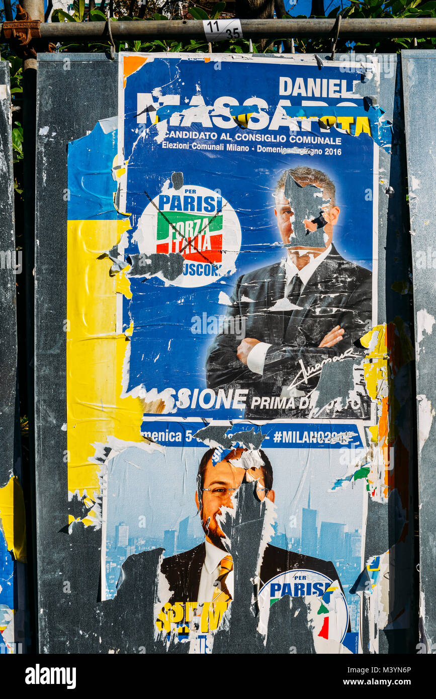 Milan, Italy. 13th February, 2018. Ripped up  defaced billboards of Daniele Massaro of Forza Italia Party and another candidate of the same Party ahead of  2018 Italian general election is due to be held on March 4th, 2018. Voters will elect the 630 members of the Chamber of Deputies and the 315 elective members of the Senate of the Republic for the 18th legislature of the Republic of Italy, since 1948. Credit: Alexandre Rotenberg/Alamy Live News Stock Photo