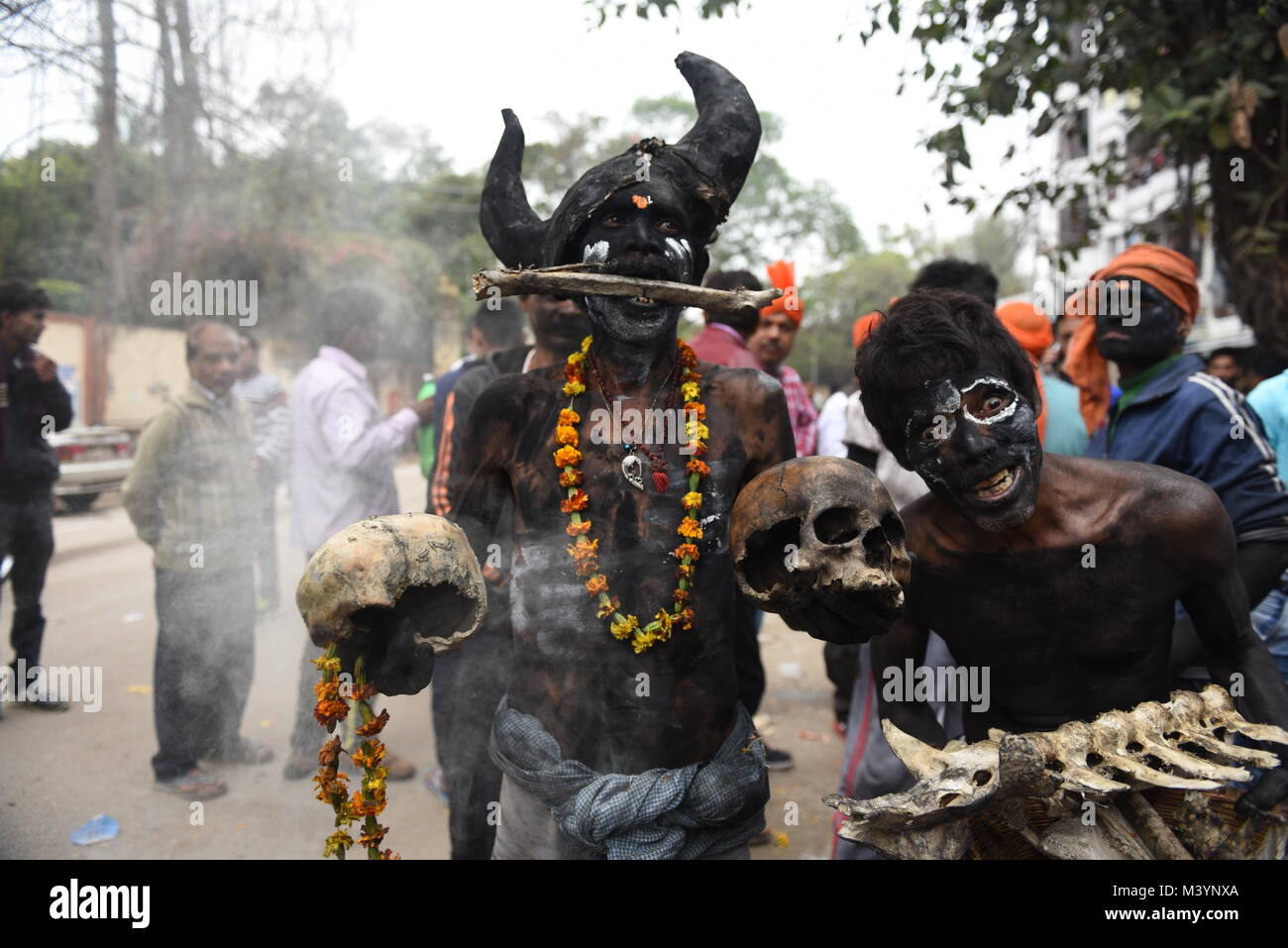 Hindu aghoris are performing with dead bodies & human skulls at Lord Shiva Barat procession on the occasion of Maha Shivaratri festival celebration in Allahabad , India on February 12 , 2018. Stock Photo
