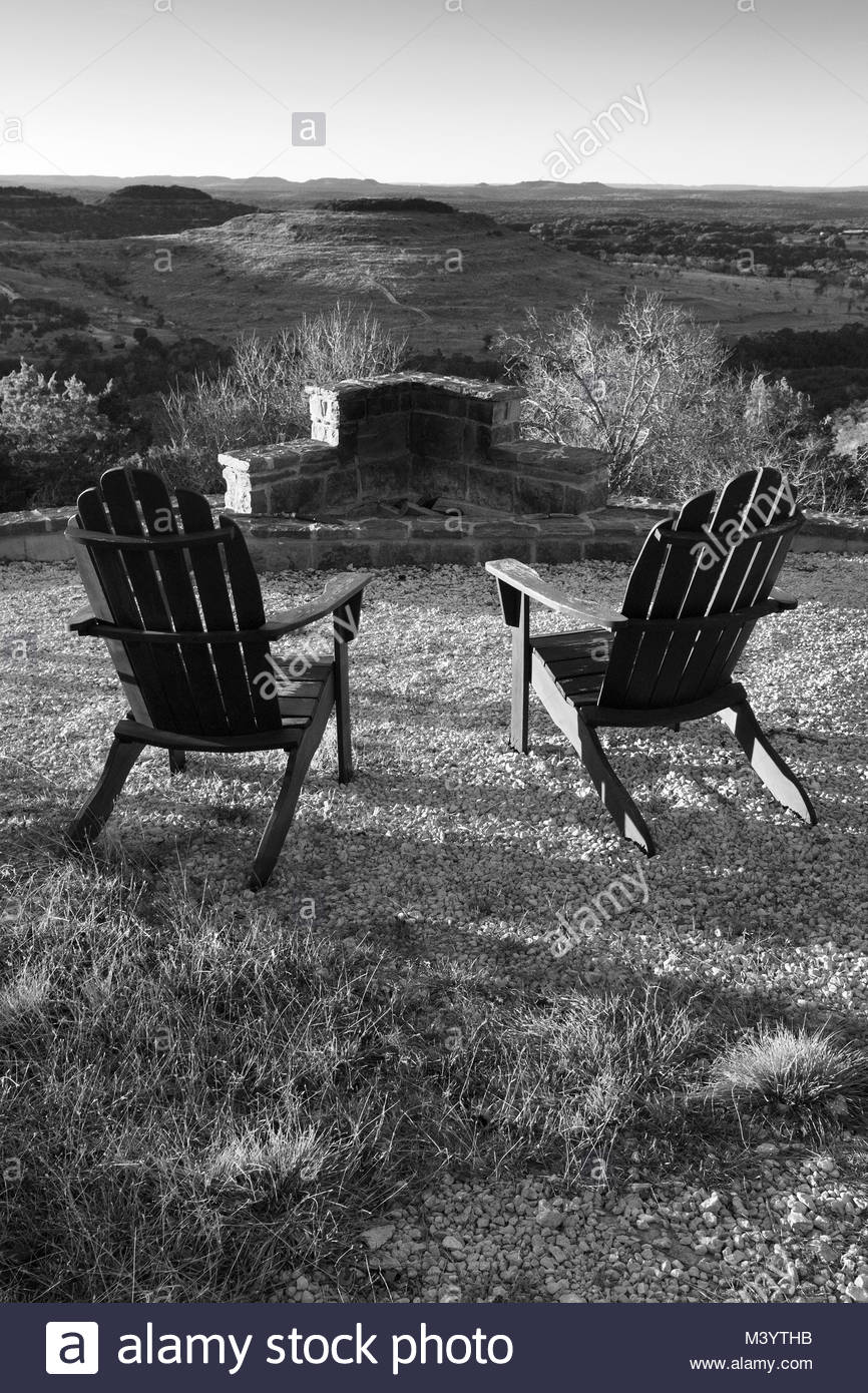 Adirondack Chairs By An Outdoor Fire Pit Overlooking The Texas