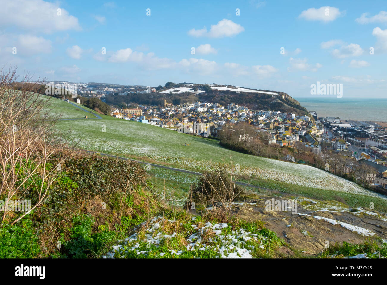 Hastings, view from West Hill across the Old Town to the snow covered East Hill, East Sussex, UK Stock Photo