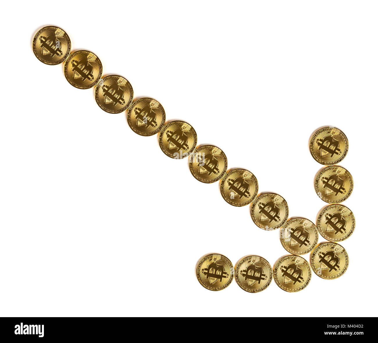 bitcoins shaped like a dropping down arrow with clipping path concept of price decrease of crypto currency Stock Photo