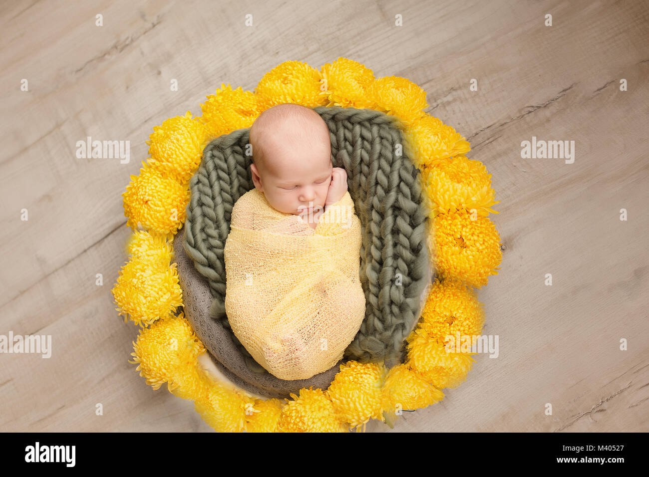 Sleeping newborn baby boy swaddled in a blanket Stock Photo Alamy