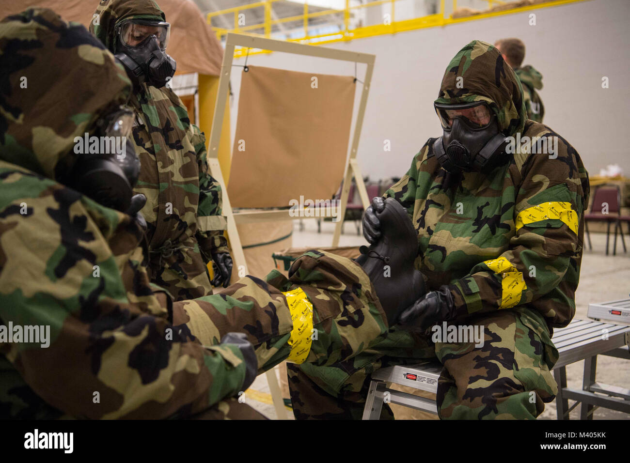 U.S. Air Force Airmen from the 130th Airlift Wing participate in chemical, biological, radiological, nuclear and explosives (CBRNE) training Feb. 4, 2018 at McLaughlin Air National Guard Base, Charleston, West Virginia. 130th Airman trained in various disciplines over the drill weekend to improve their overall readiness in the event of an attack at home or abroad. (U.S. Air National Guard photo by Tech. Sgt. De-Juan Haley) Stock Photo